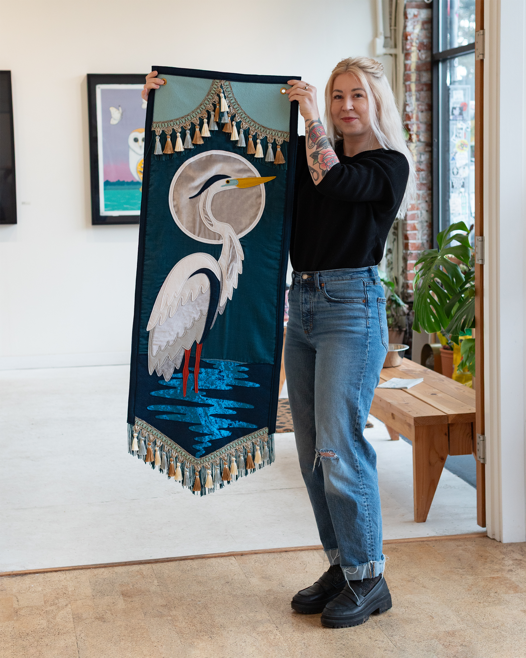 "Grey Heron" (2025) wool-blend felt, velvet, fringe & tassel trim, thread, brass grommets, 18”x50”