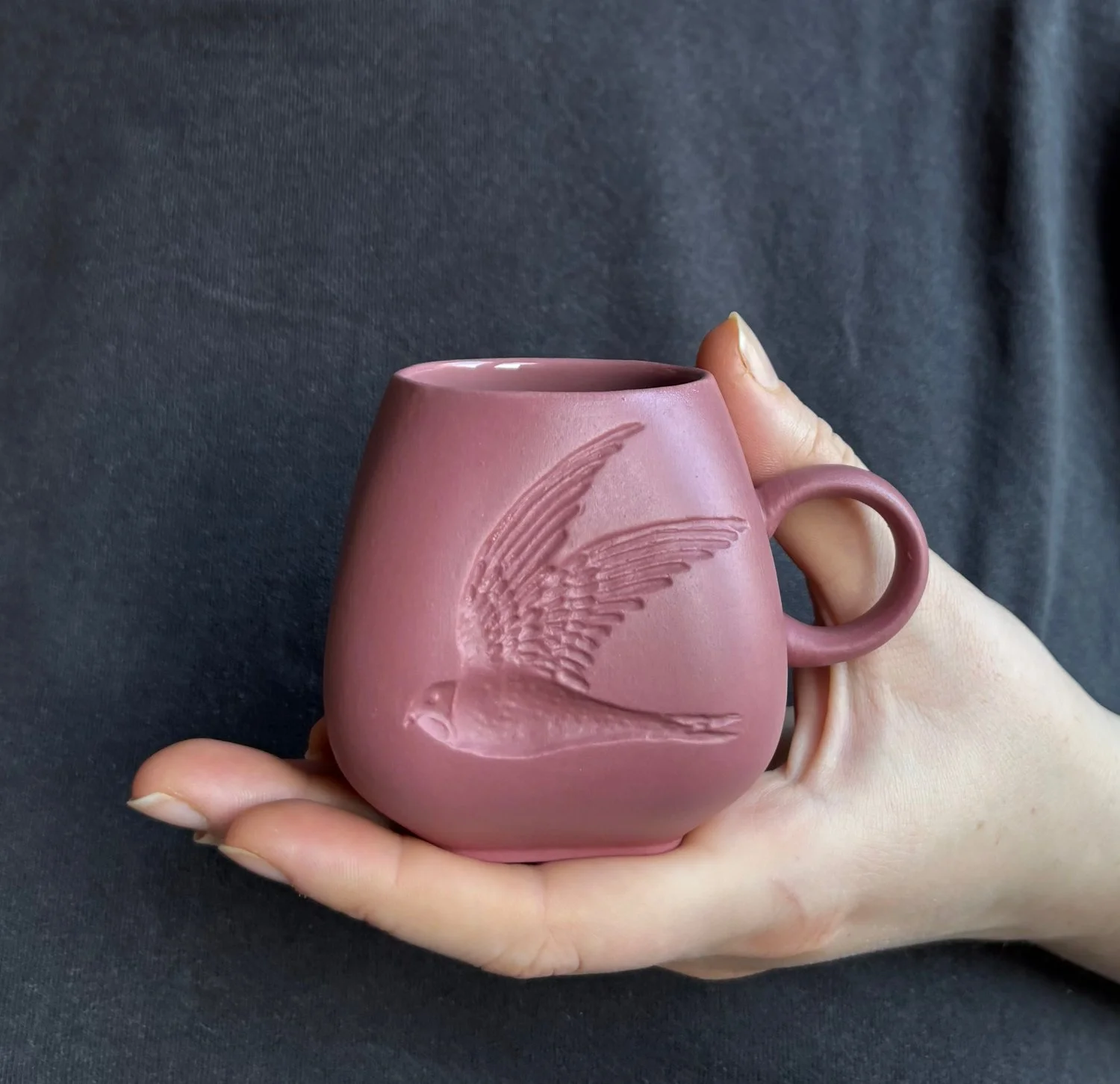 Swift_espresso_mug_mulberry_held.jpg