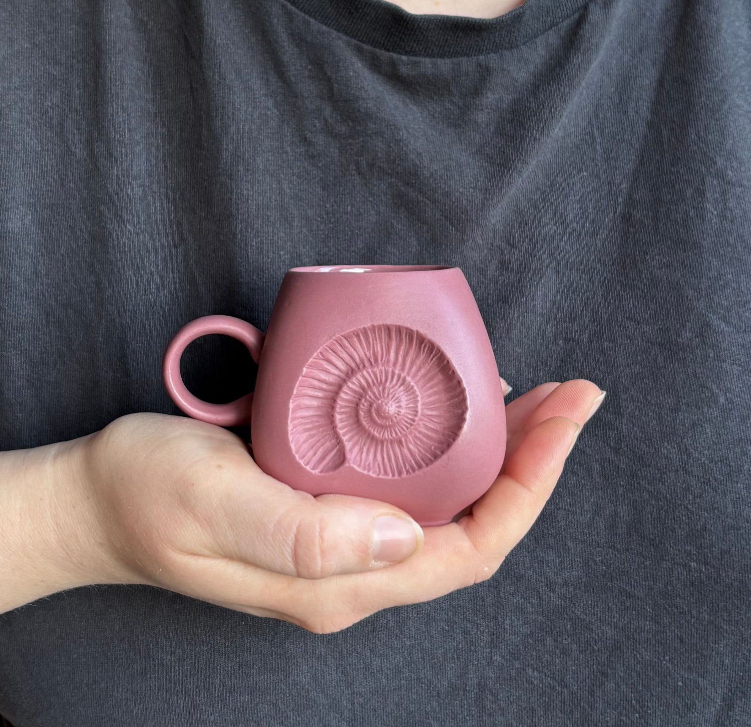 Ammonite espresso mug held mulberry.jpg