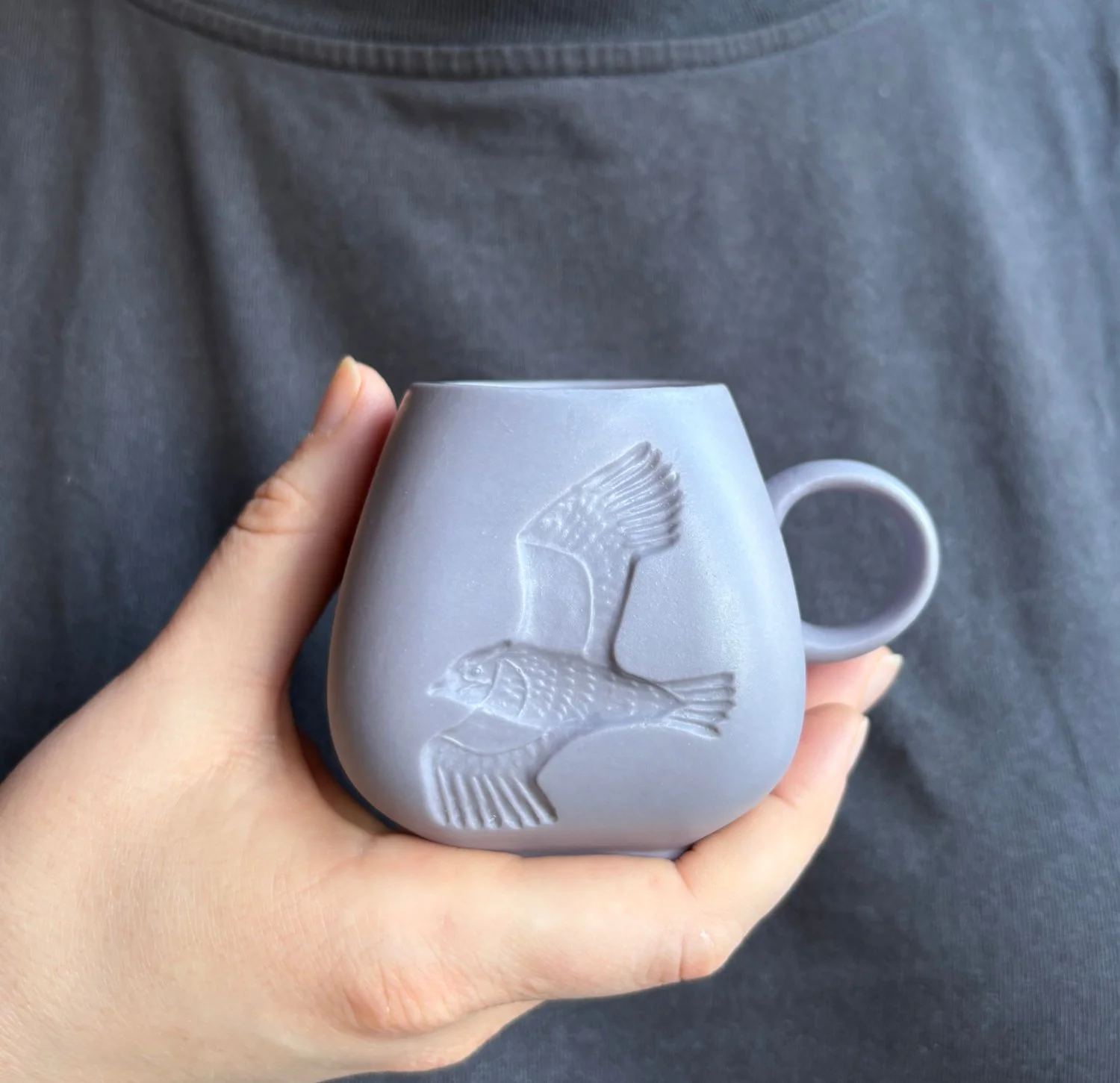 Lapwing espresso mug held lavender grey.jpg