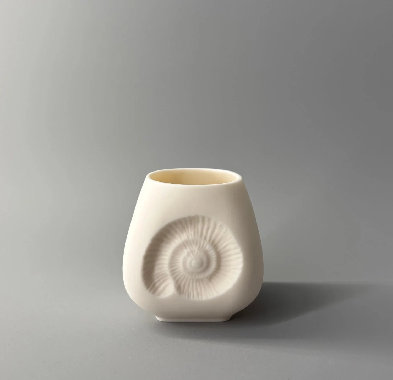 Ammonite tea light.jpg