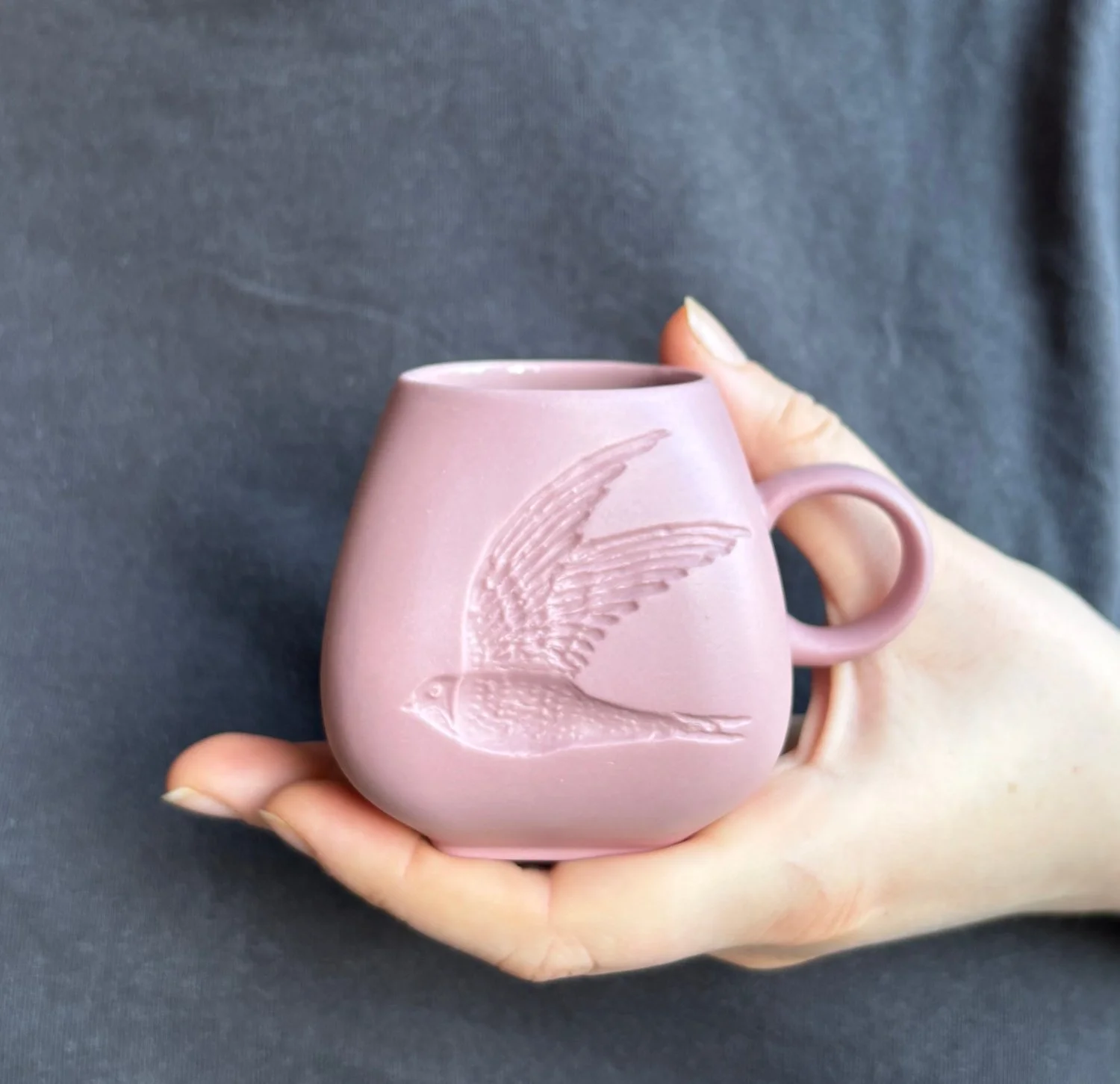 Swift_espresso_mug_dusky_pink_held.jpg