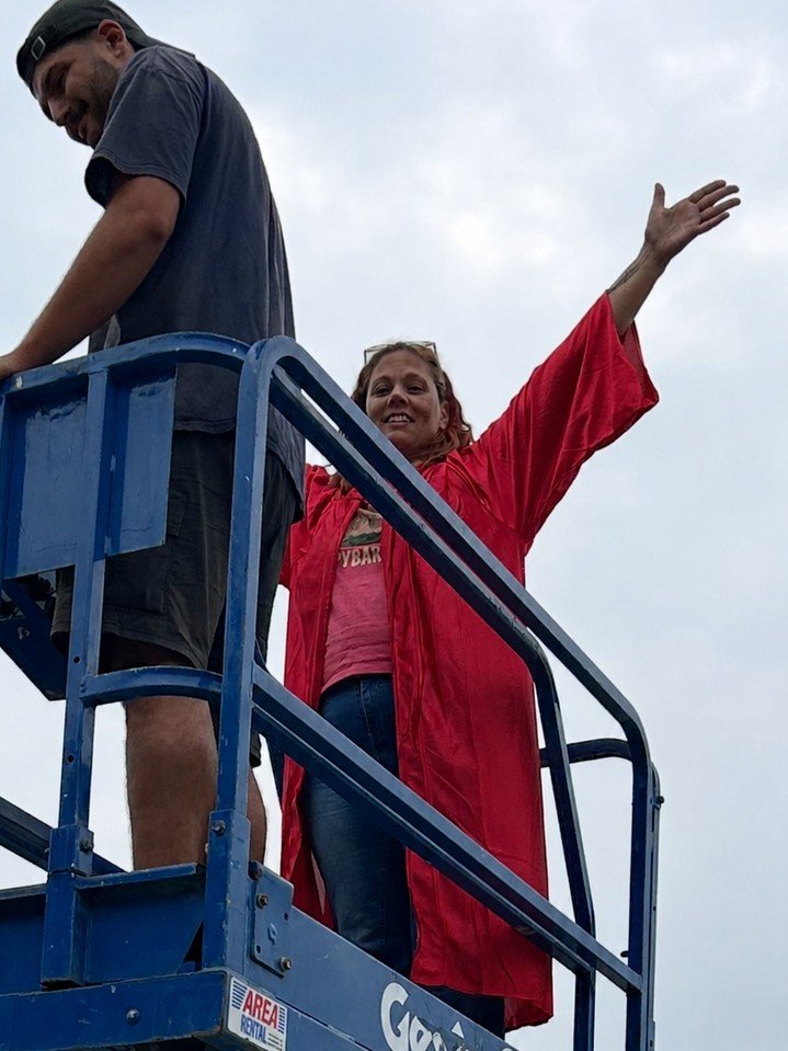 Mrs. Stollenwerk has always had a dream of soaring through the air, suspended from a construction crane while wearing her choir robe. We have absolutely no explanation for where this idea came from, and frankly, we're a little afraid to ask. 

Since 