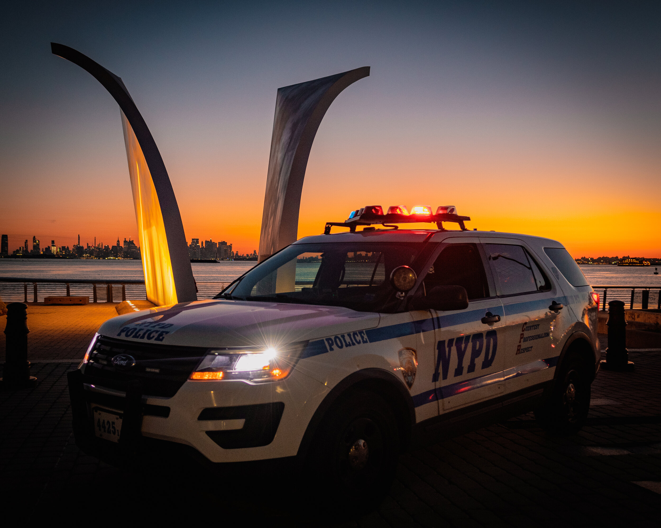 Sunrise at Staton Islands Post Card 9-11 Memorial. Was lucky to have captured an NYPD patrol vehicle that morning. Really brought all of the elements of the photo together.  