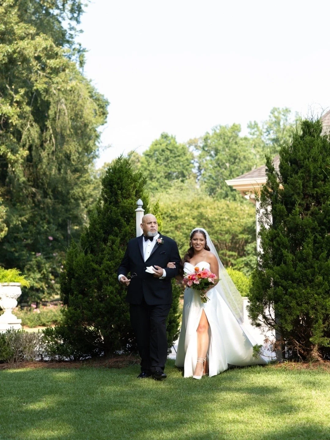 The entrance. That's it, oh my. Entrances are so important to me. Capturing this scene defines the moment the bride is finally seen and it signifies the start of forever, officially :) 
 
Let's also give a second to appreciate this dresssss! Wow. 
 
