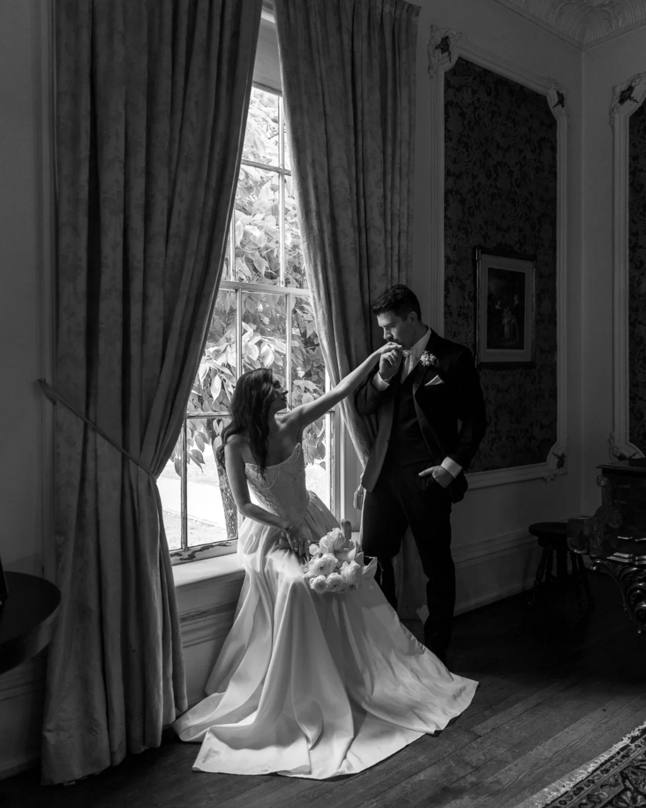 I'm starting to become more obsessed with black and whites, I mean.... come on. And then the hand kiss? Whew. Yes! I literally had no choice but to turn this image into black and white. It fit the mood perfectly, and made the story even more worth it