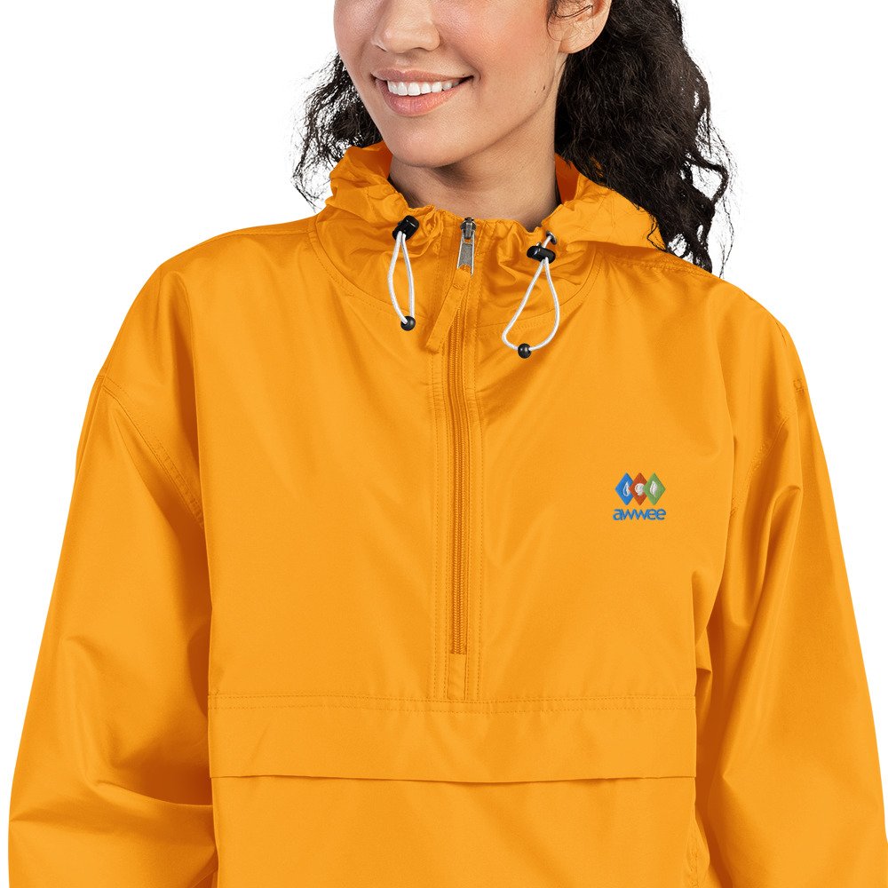 embroidered-champion-packable-jacket-gold-zoomed-in-66f5b9c18ecf7.jpg
