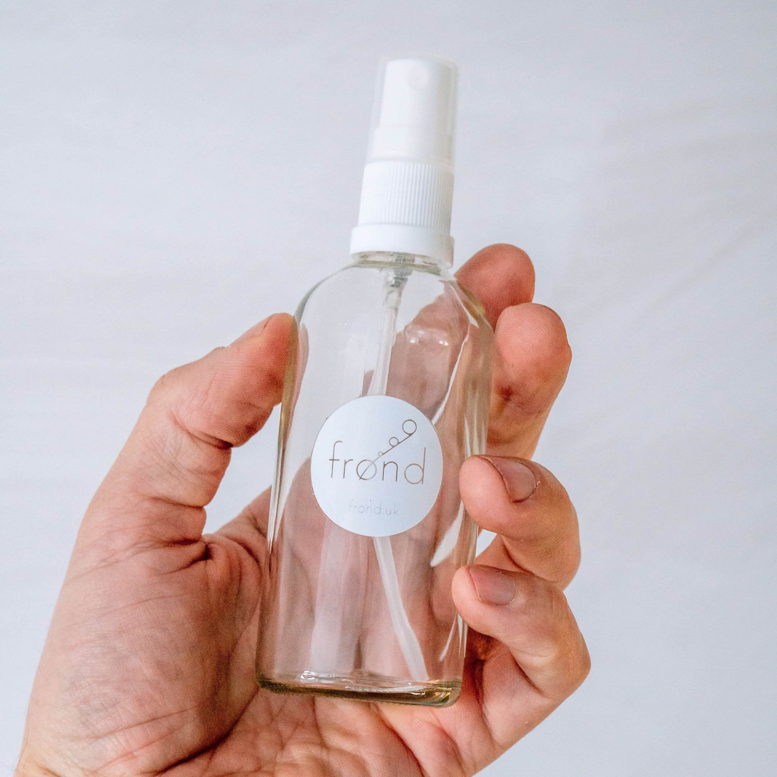 Frond_100ml_mister_spray-bottle-hand_OPT.jpg