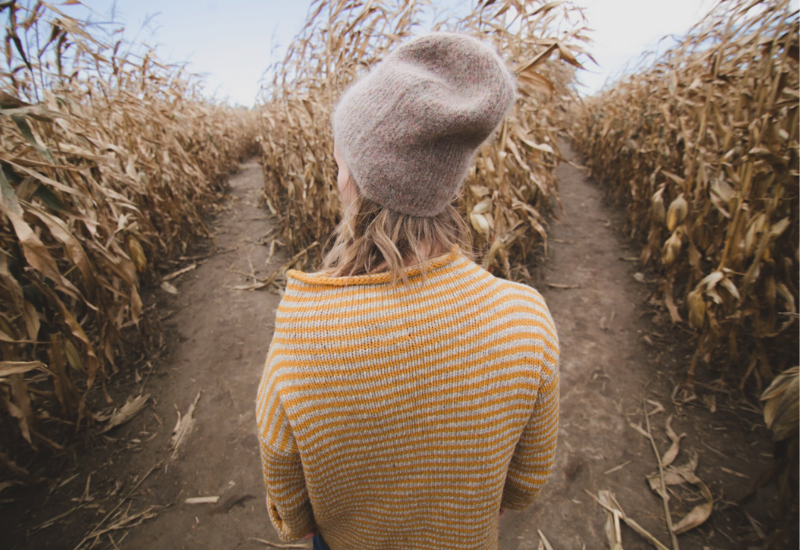 woman with yellow striped sweater