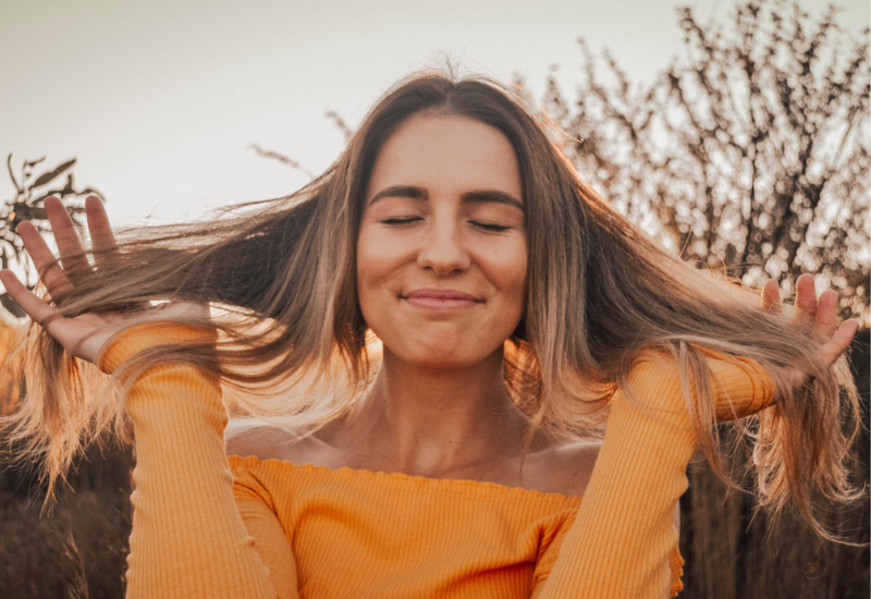 Woman playing with hair