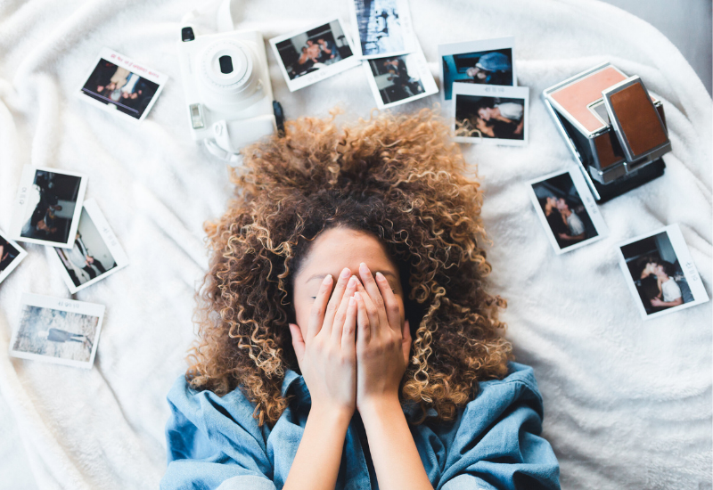 Woman with polaroids