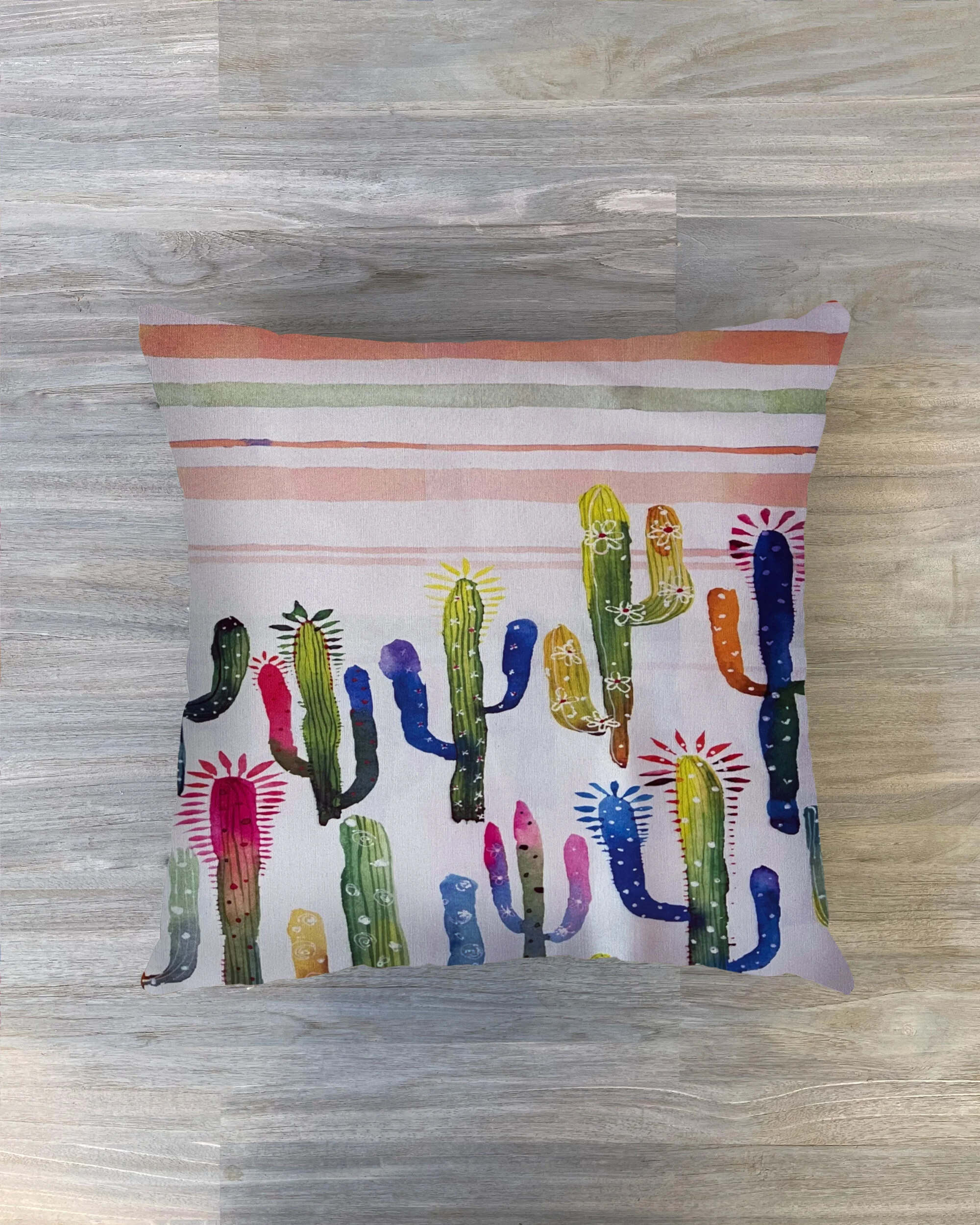 cactus fabric with horizonal stripe cushion on light timber background