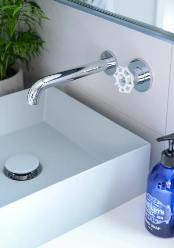 Blue basin with chrome and white tapware.jpg