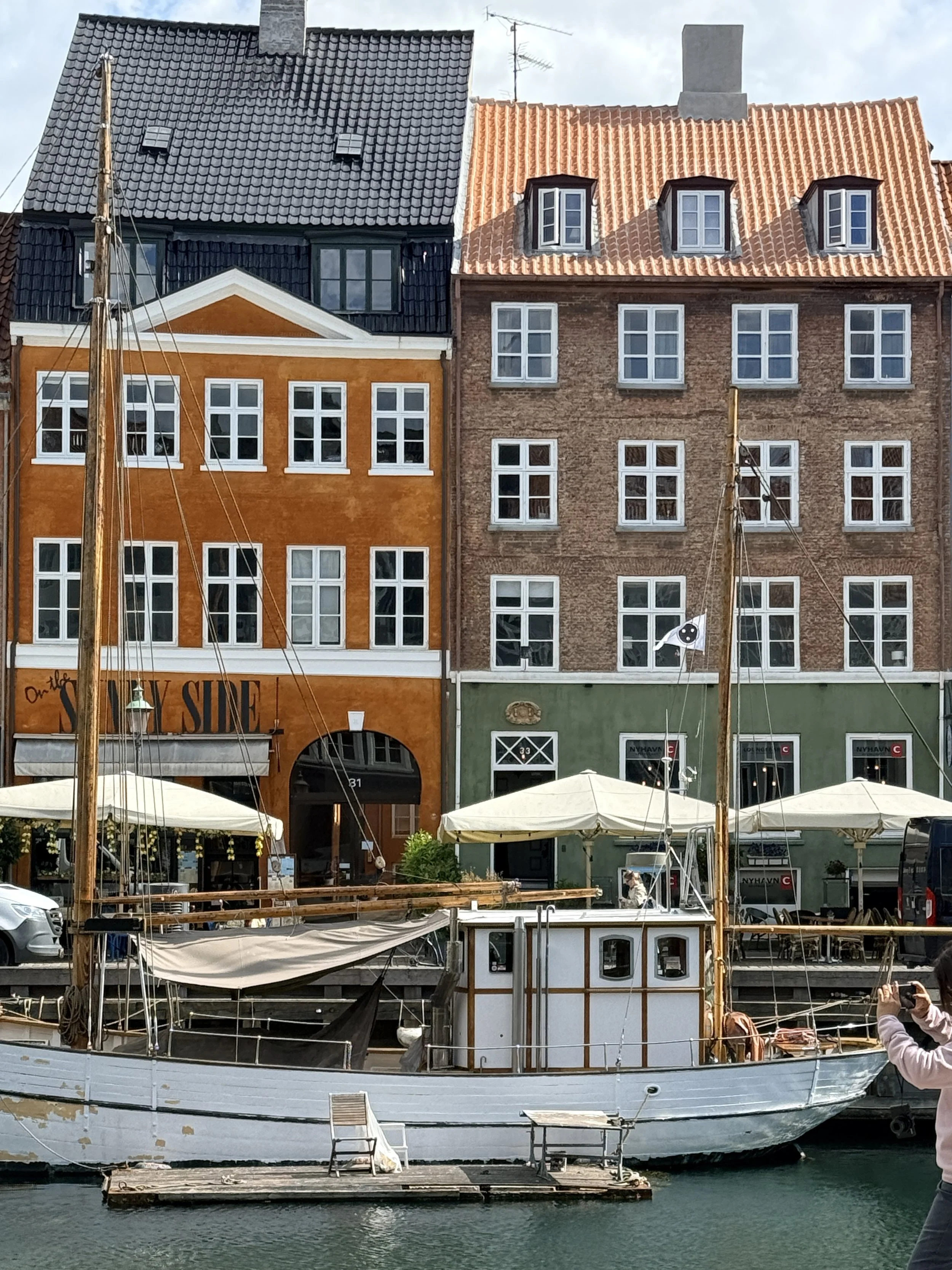 Colourful buildings lining Nyhavn canal in Copenhagen