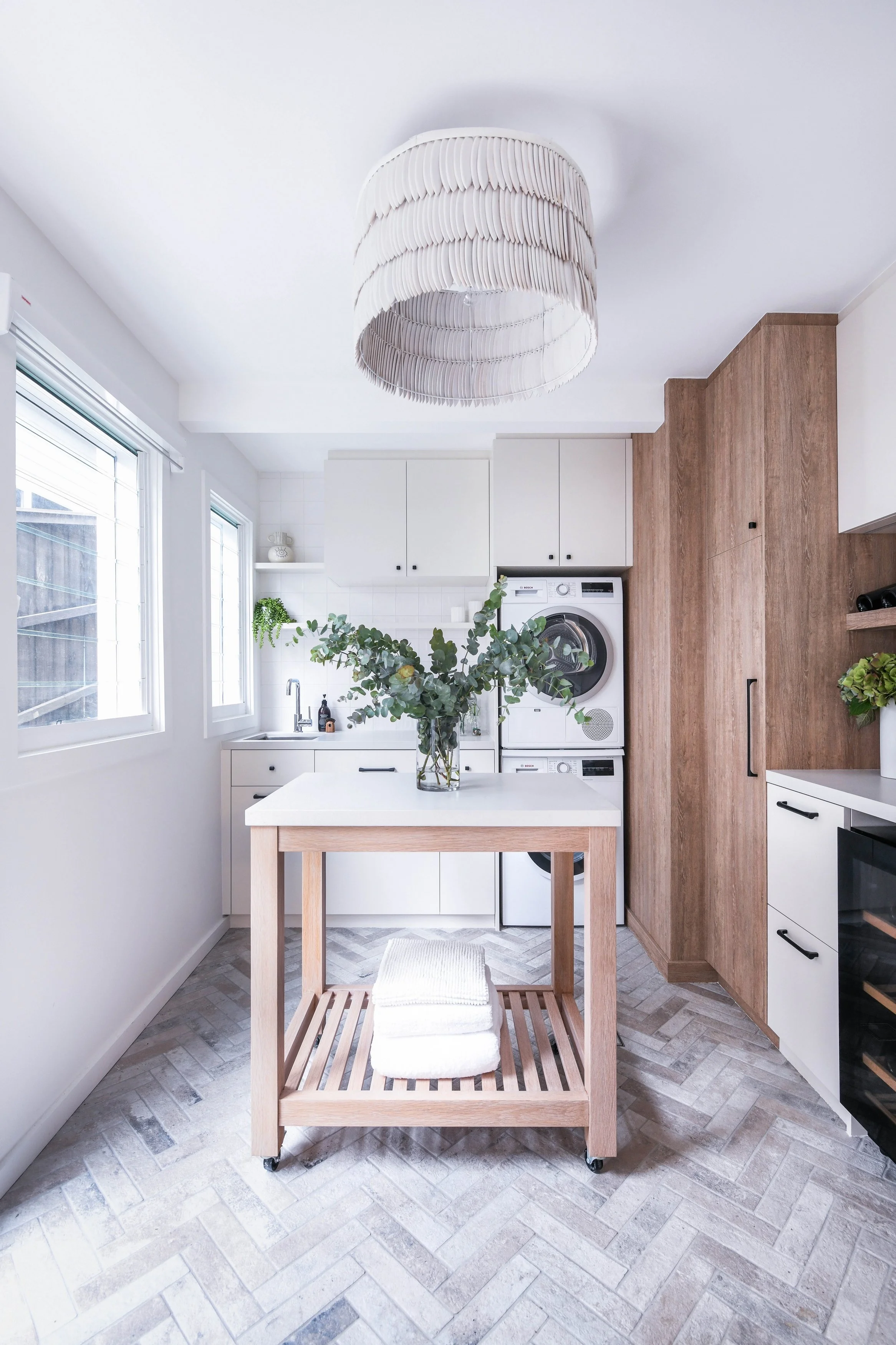 Spacious laundry with movable folding table