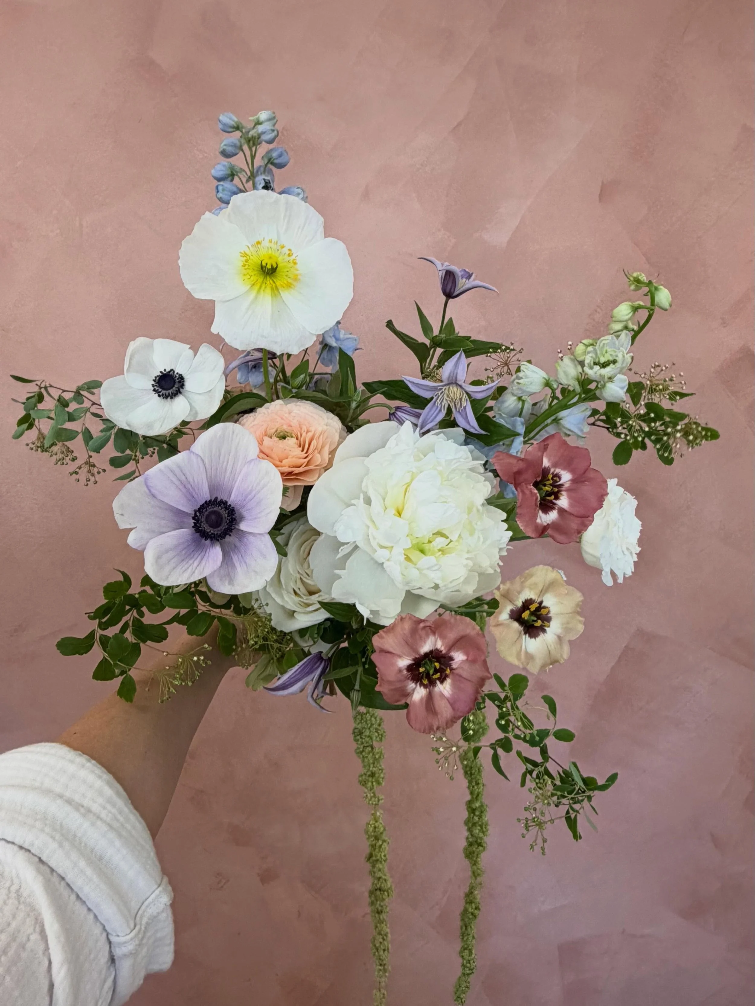 Another peek at the maids bouquets we created last week. Featuring so many locally grown goodies from flower farmers right here in Ontario 🌱🤍

Anemones @frenchblooms 
Poppies @petitflowerfarm 
Ranunculus @virgil_greenhouses 
Peonies @ofgmarketplace