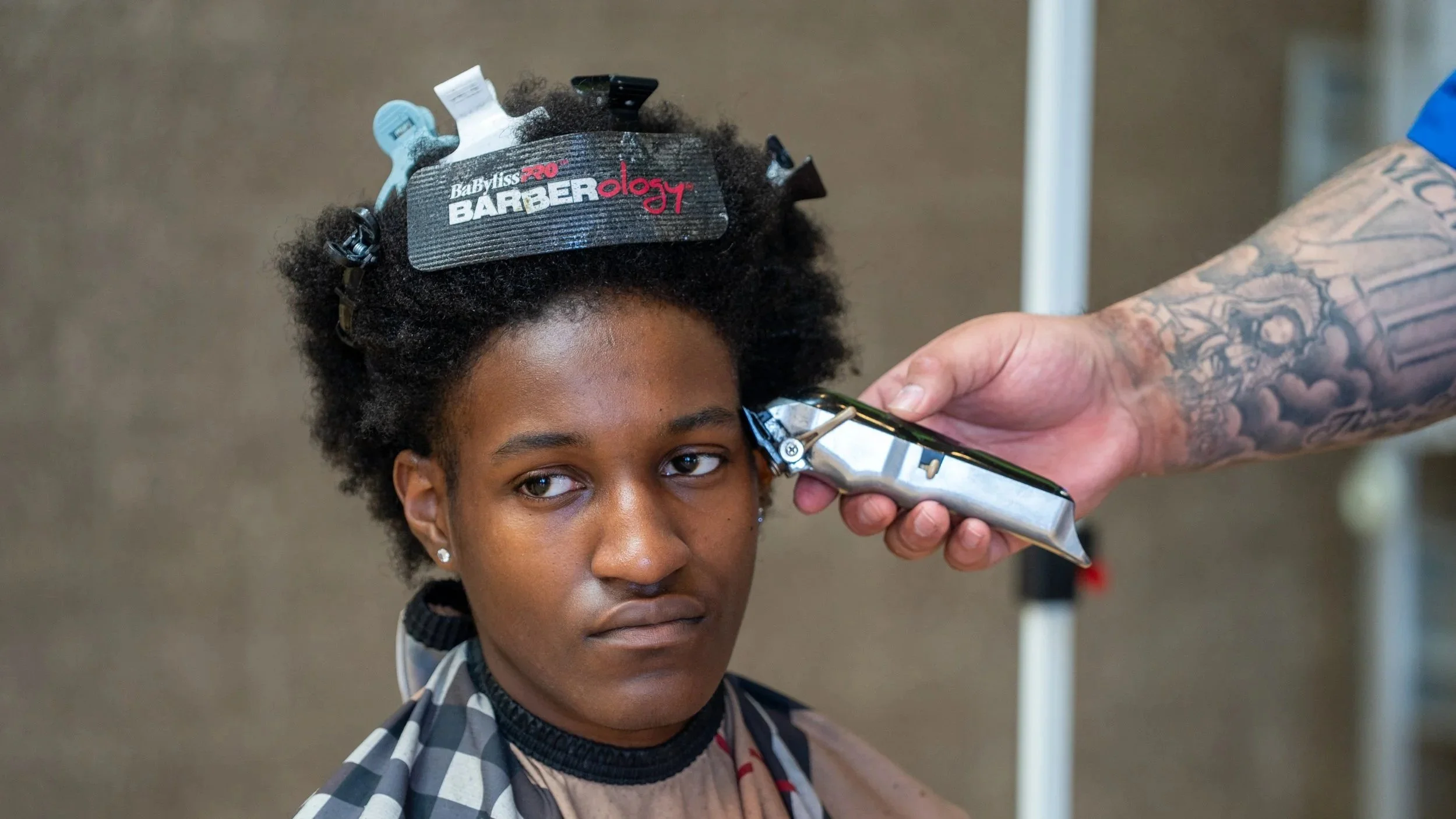 Fresh Cuts, Stronger Bonds: FAST Hosts Barbershop Chat, Chew & Play
