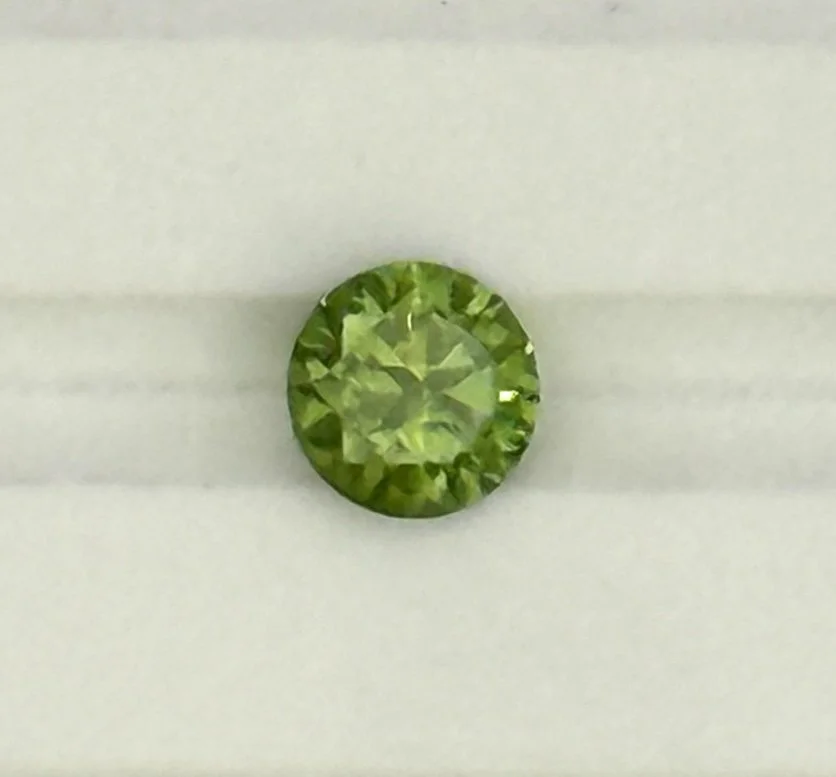 Demantoid Garnet, 0.51 carats, Russian, no heat. Lovely 'horsetail' inclusions.