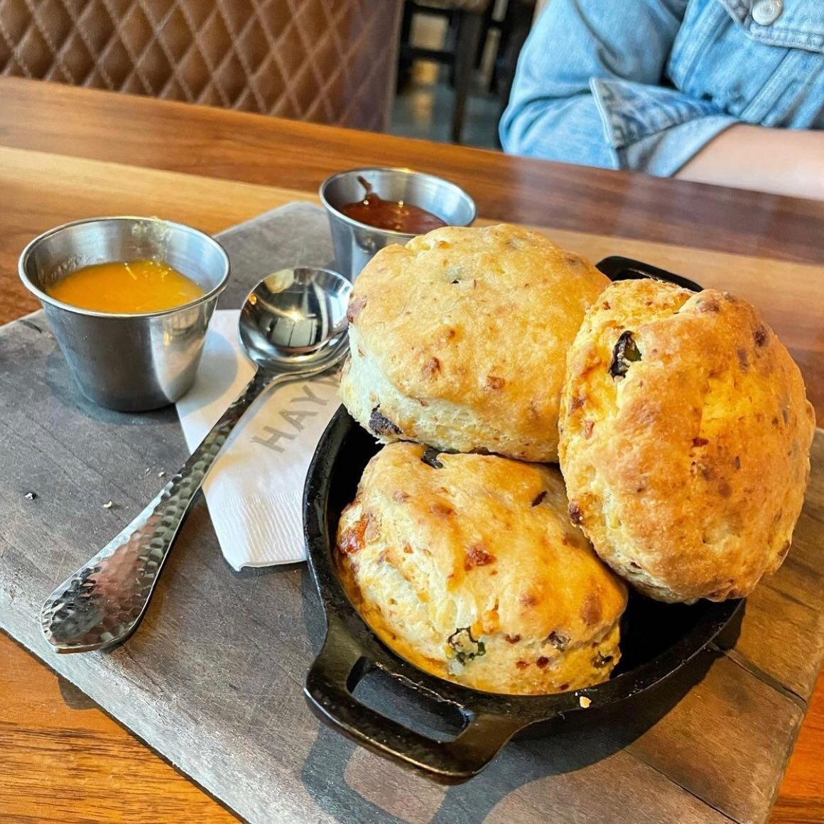 Go ahead and order a Brunch appetizer! These cast iron cheddar, bacon, and jalape&ntilde;o biscuits are amazing 🤤 @haywireplano #legacywest @sheeatsdallas