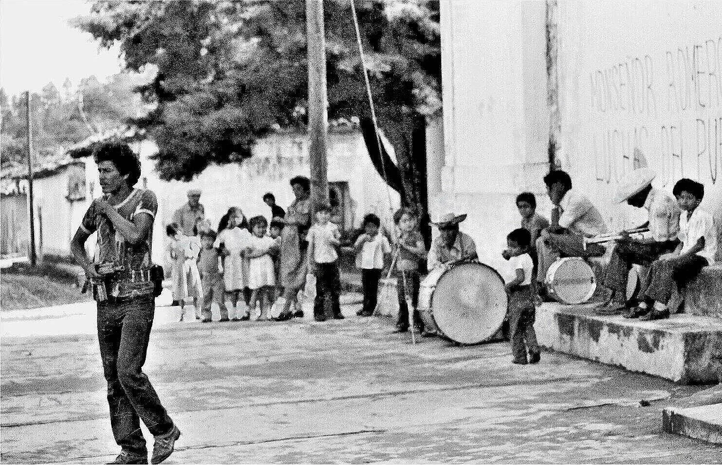 ROLE MODEL  — guerrilla in front of church in San Ignacio 