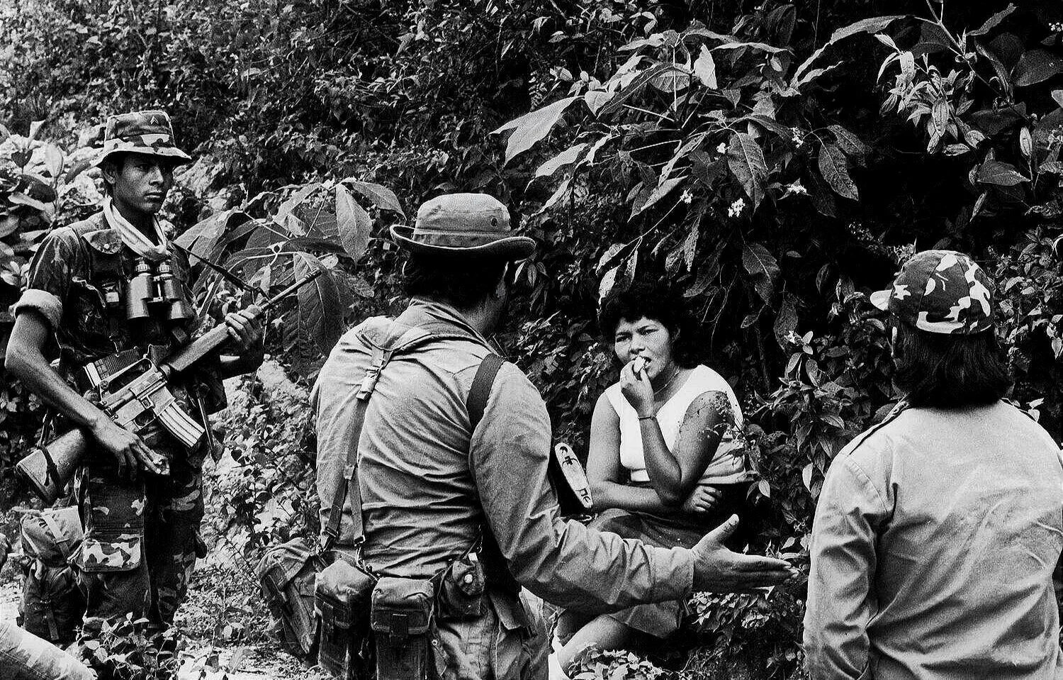 INTERROGATION   —   captured guerrilla nurse questioned by military intelligence officer, near San Fernando 