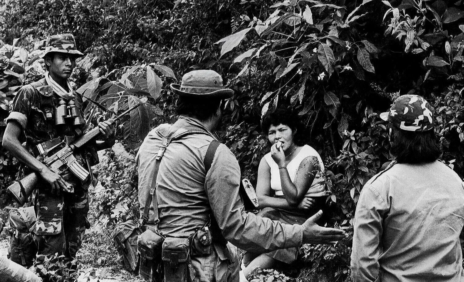 INTERROGATION   —   captured guerrilla nurse questioned by military intelligence officer, near San Fernando 