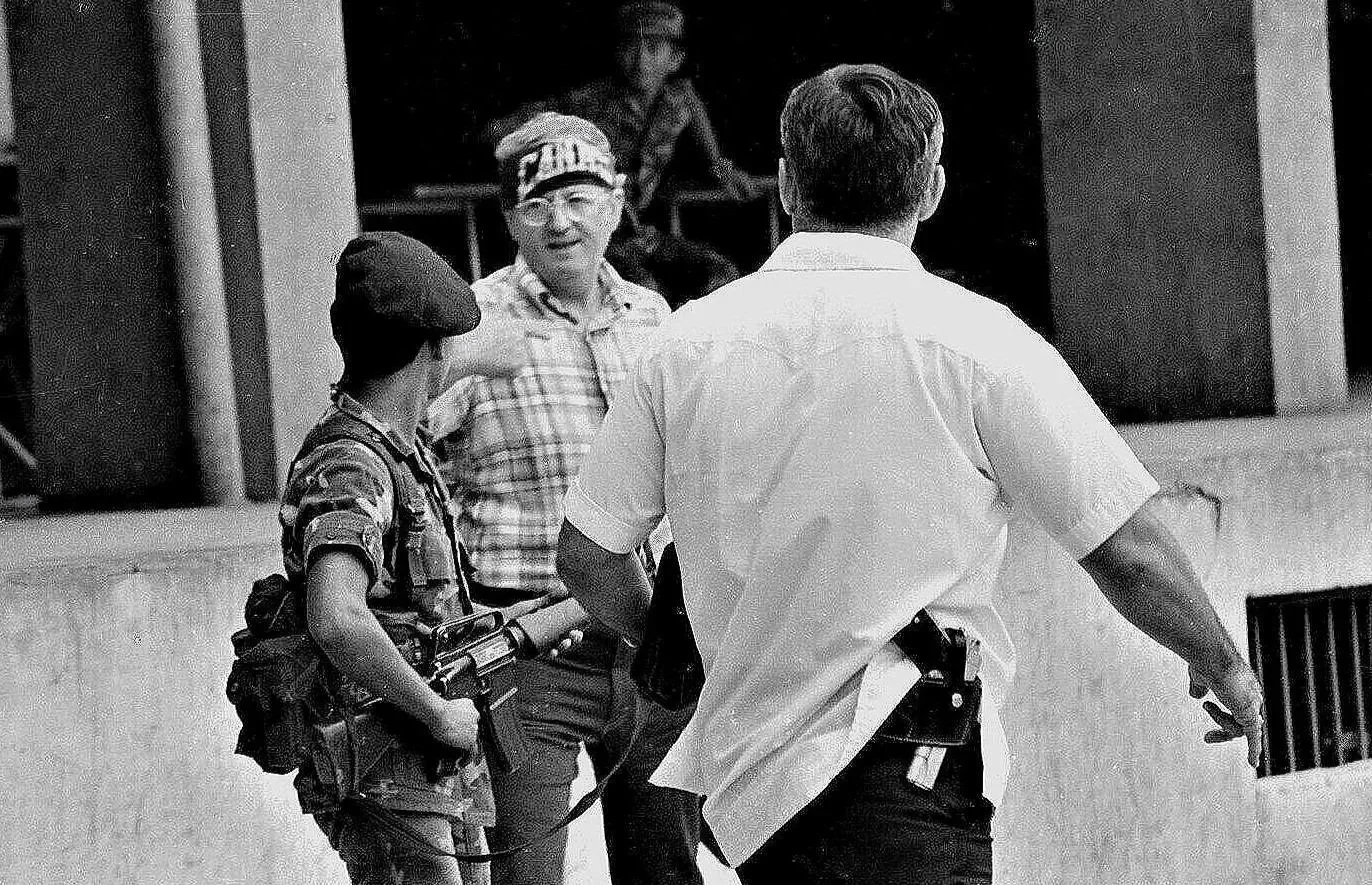IT'S ALL ABOUT ME       —      American  Congressman asks soldier for photo with the brigade's bandana tied around his head - 5th Brigade fort, San Vicente