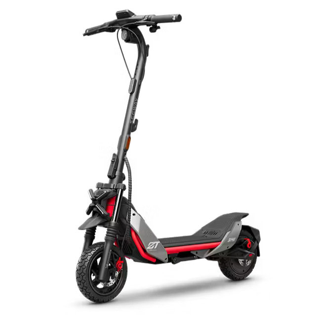 Black electric scooter with red accents and wide tires, shown against a black background.