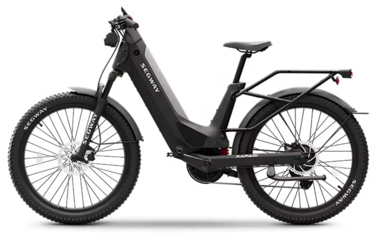 Black electric fat-tire bicycle with a step-through frame and disc brakes against a black background.