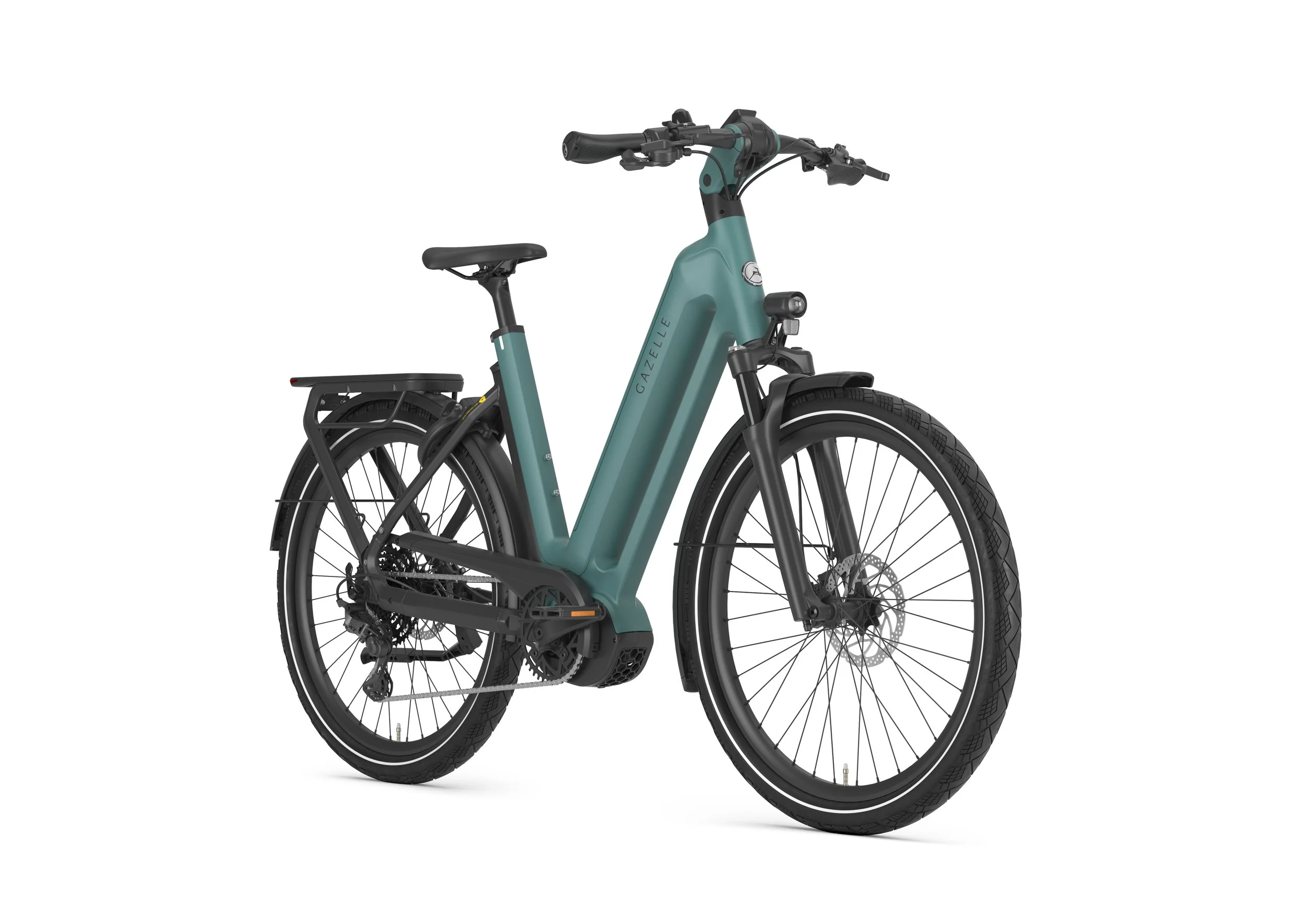 A teal and black electric bicycle with the brand name 'GAZELLE' on the frame, featuring a sleek design with thick tires and a rear cargo rack.