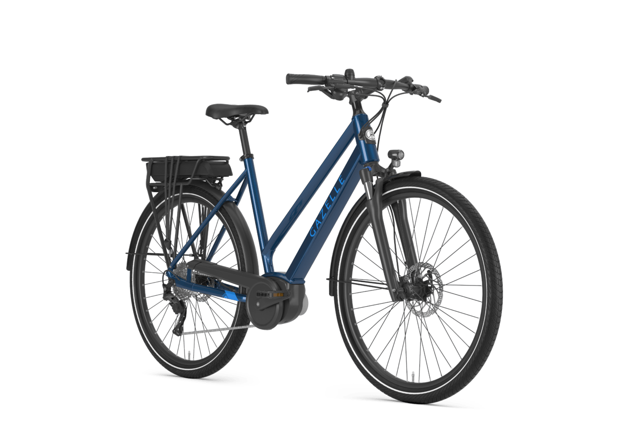 Blue Gazelle electric bicycle with a rear cargo rack and disc brakes.
