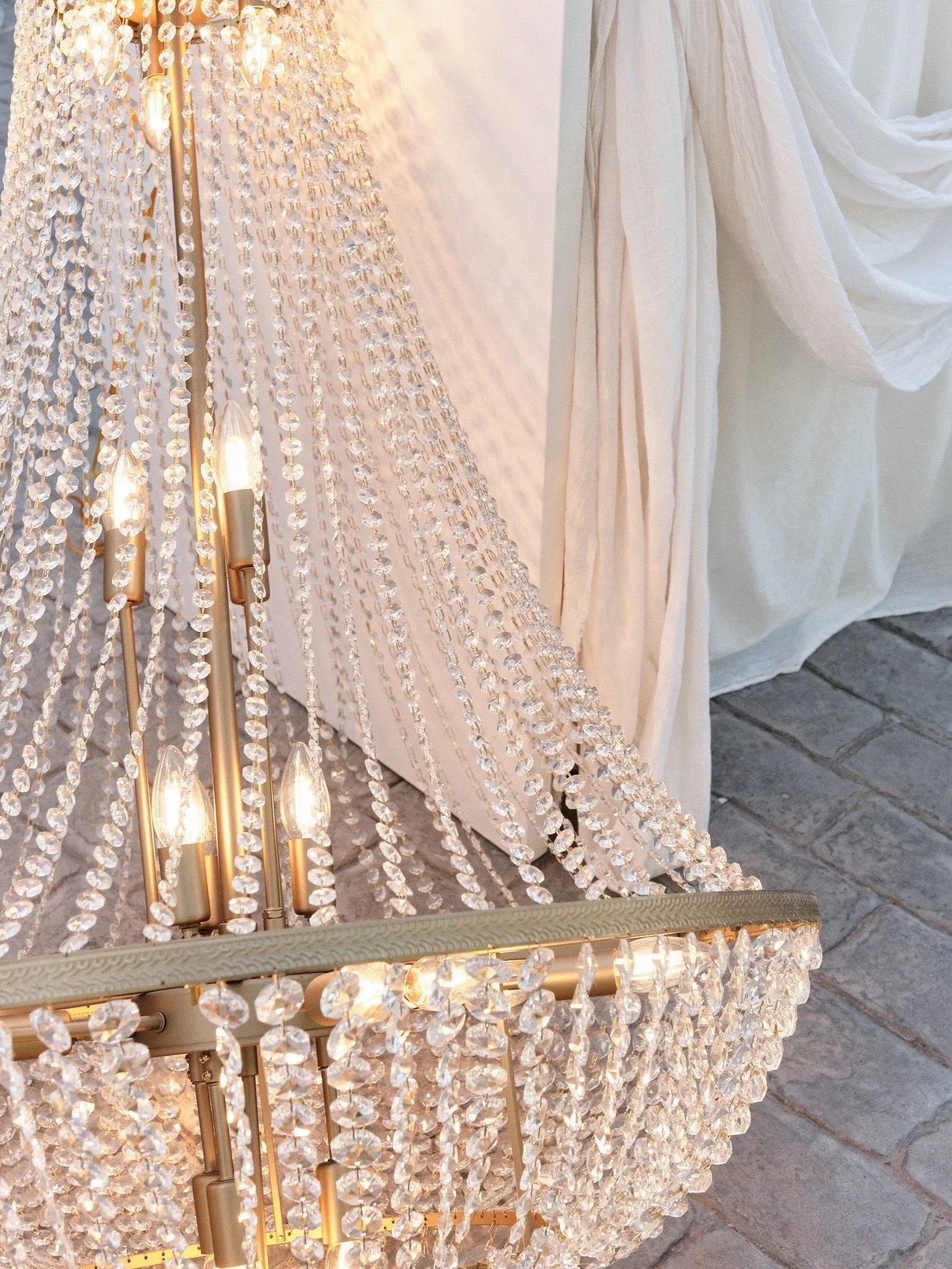 There&rsquo;s something quietly mesmerising about a chandelier resting on the floor - a touch of decadence, perfectly misplaced.

Wedding Planner &ndash; JC Bespoke Events @jcbespokeevents
Venue - Puig Redo @puigredo
Catering &amp; Bar &ndash; Crisp 