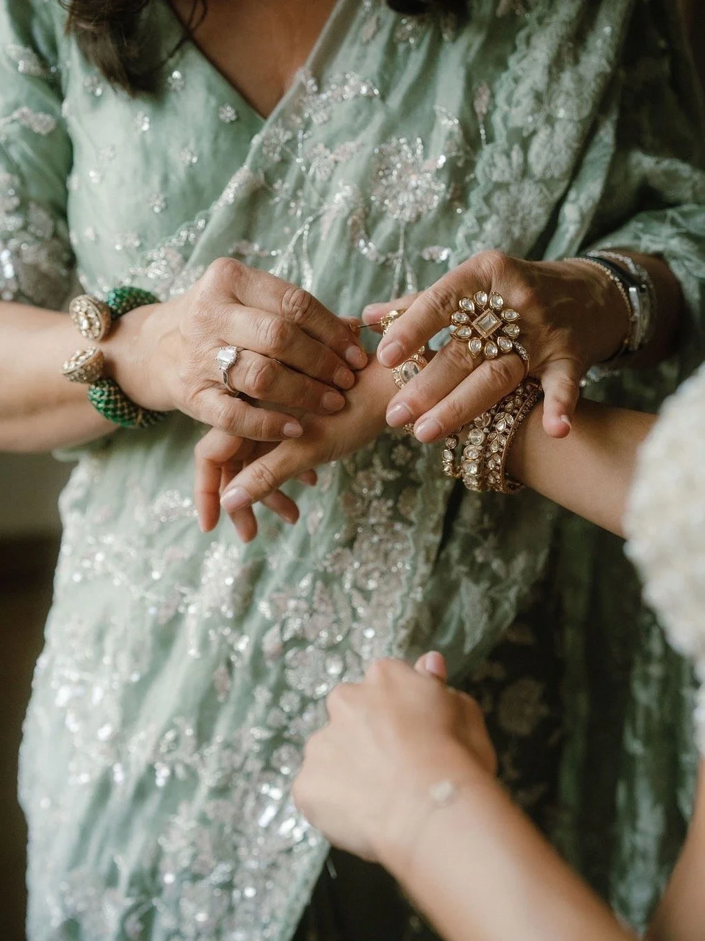 The mother of the bride - adding the final touch.
A bracelet, a blessing, a lifetime of love.

Wedding Planner @jcbespokeevents
Catering @crispcateringibiza
Wedding Cake @katieskitchenibiza
Florals @aureafloralstudio
Production @ibizaprodj
Photograph