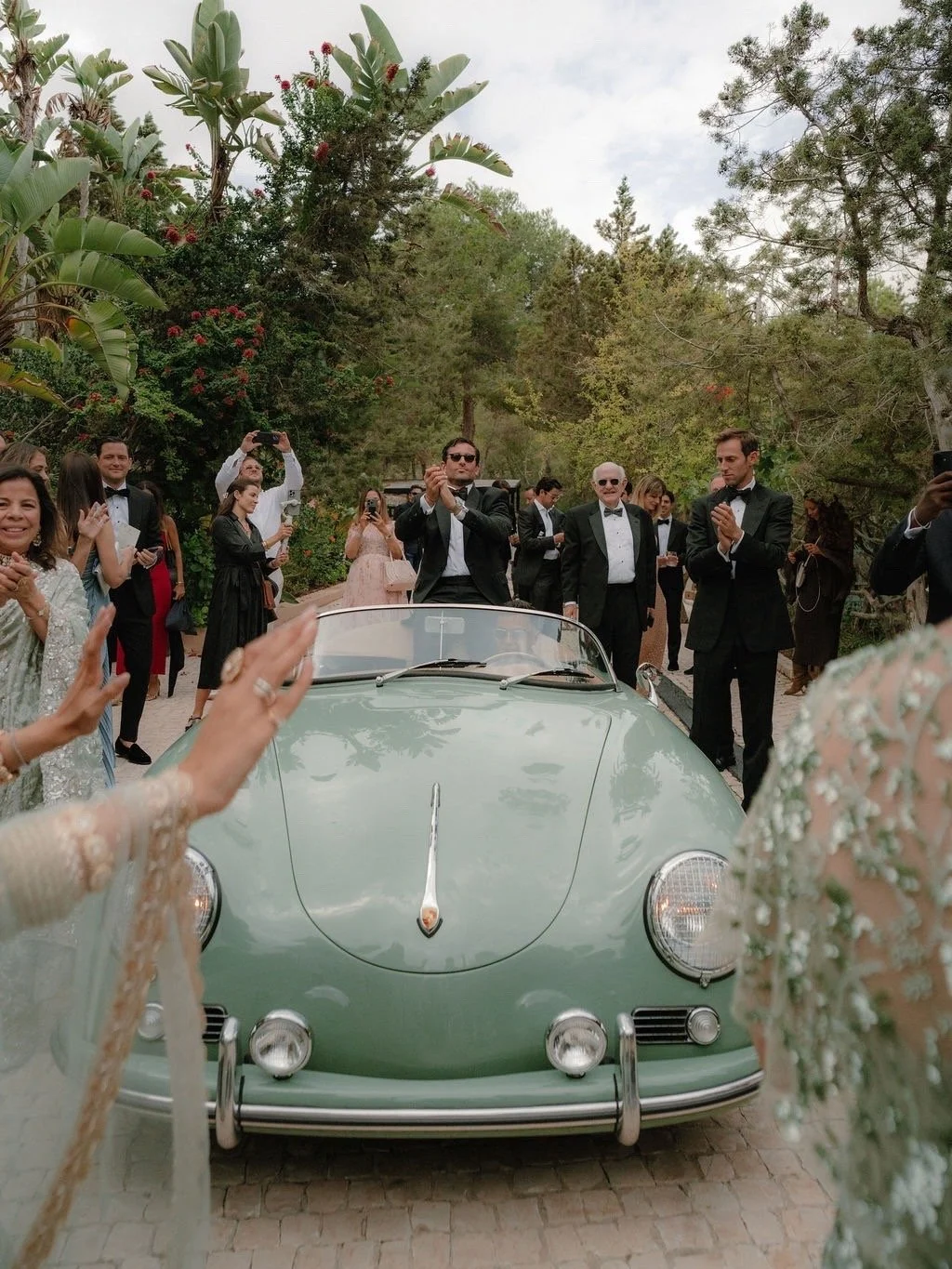 David made his entrance in a sage green vintage Porsche - a modern knight on four wheels, ready for his bride.

Wedding Planner @jcbespokeevents
Catering @crispcateringibiza
Wedding Cake @katieskitchenibiza
Design &amp; Styling @jcbespokeevents
Flora