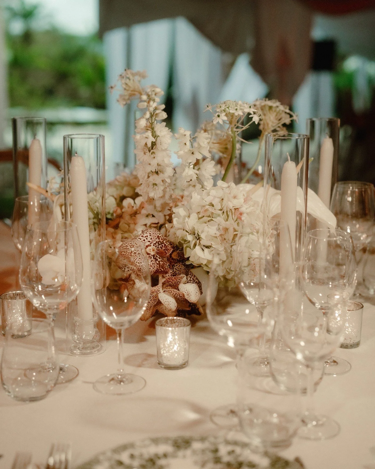 A lesson in understated elegance.

Hydrangeas, orchids and candlelight, all coming together in perfect balance.

Proof that sometimes the most memorable tables are the ones that whisper rather than shout.

Wedding planner &amp; designer - Johanna Car