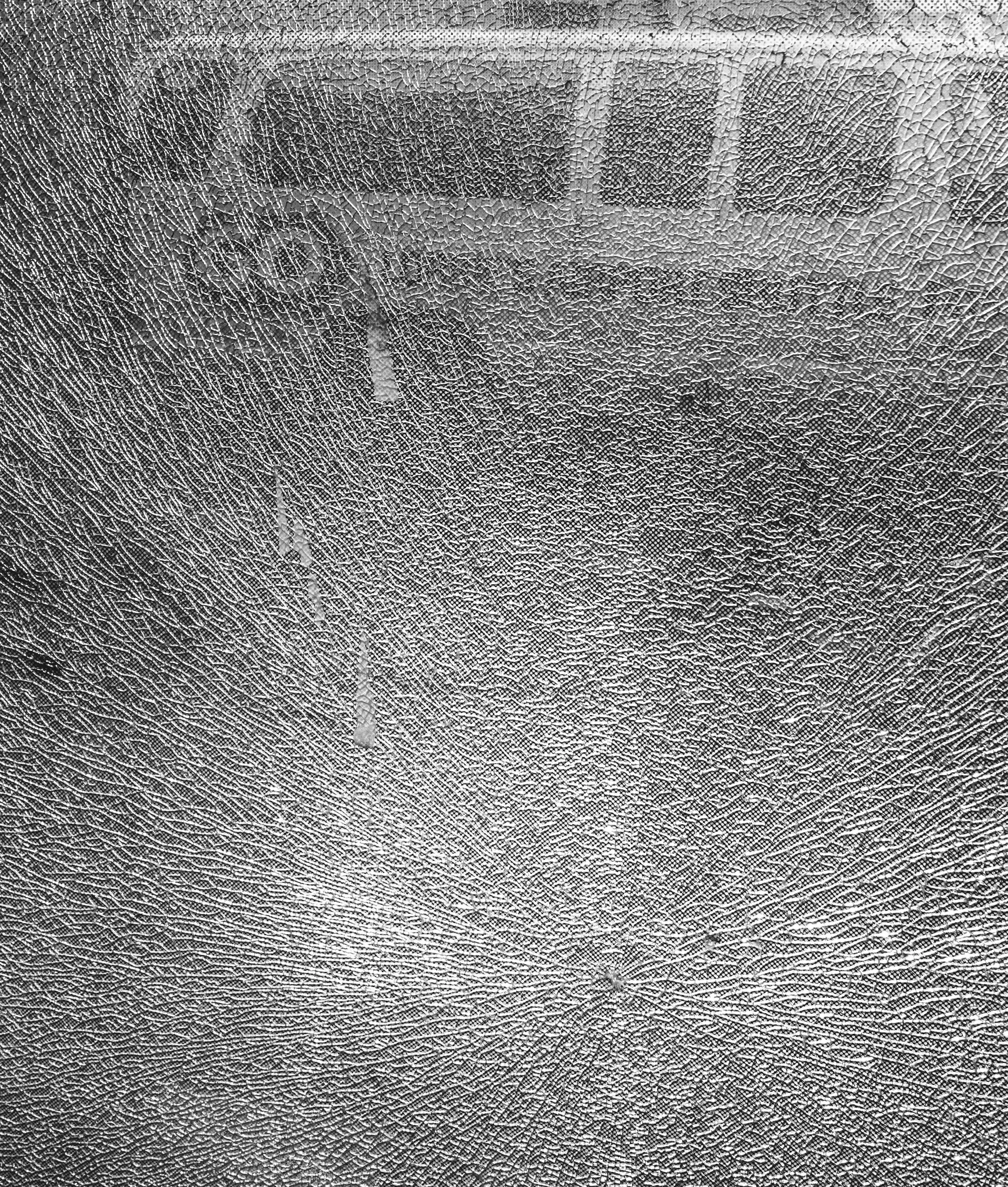 Shattered bus stop glass in San Francisco, California 
Photographed by Kyle Eagling 