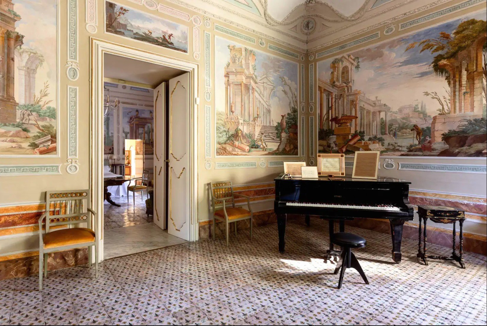 villa tasca piano in frescoed room.jpg
