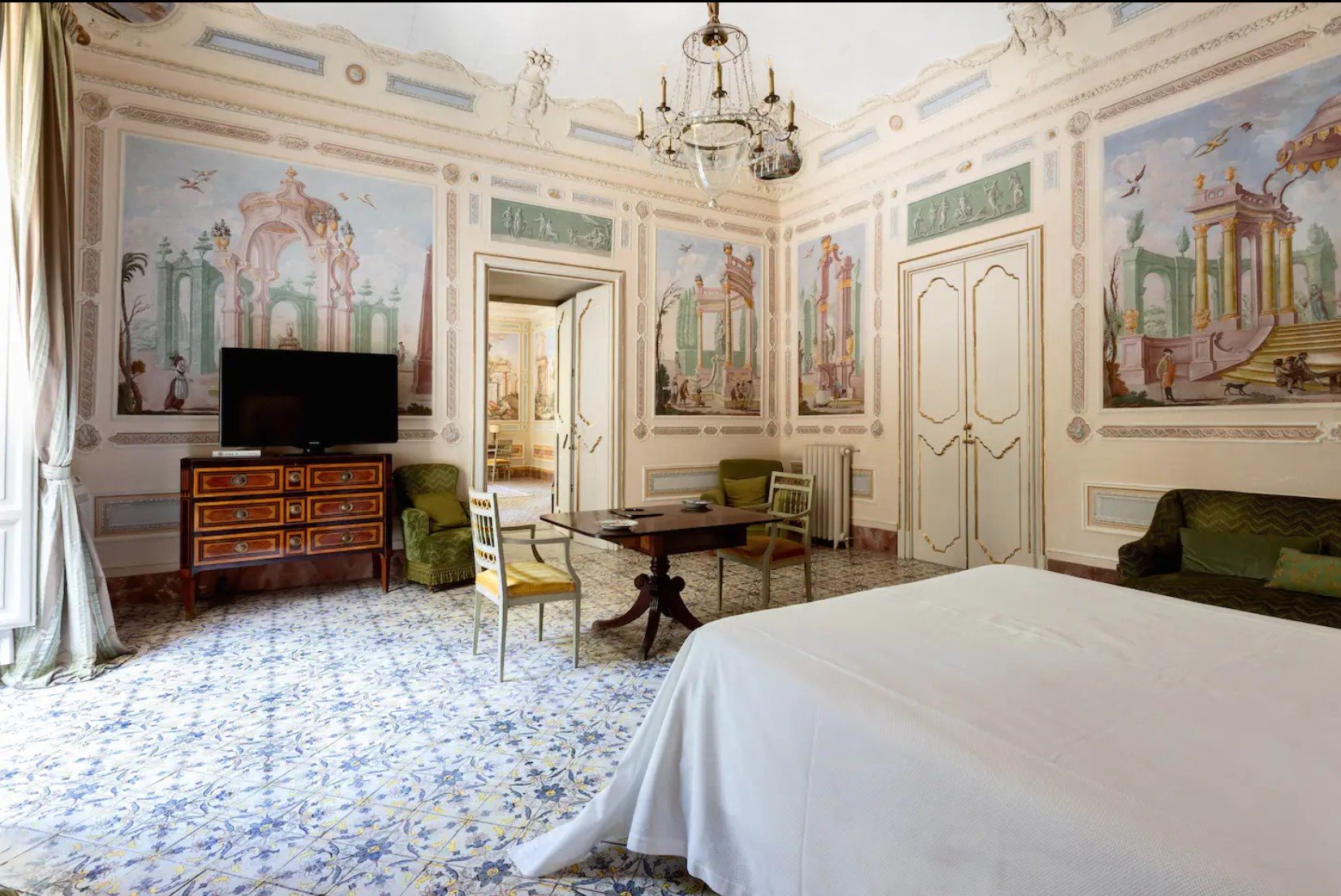 villa tasca tv in large bedroom.jpg