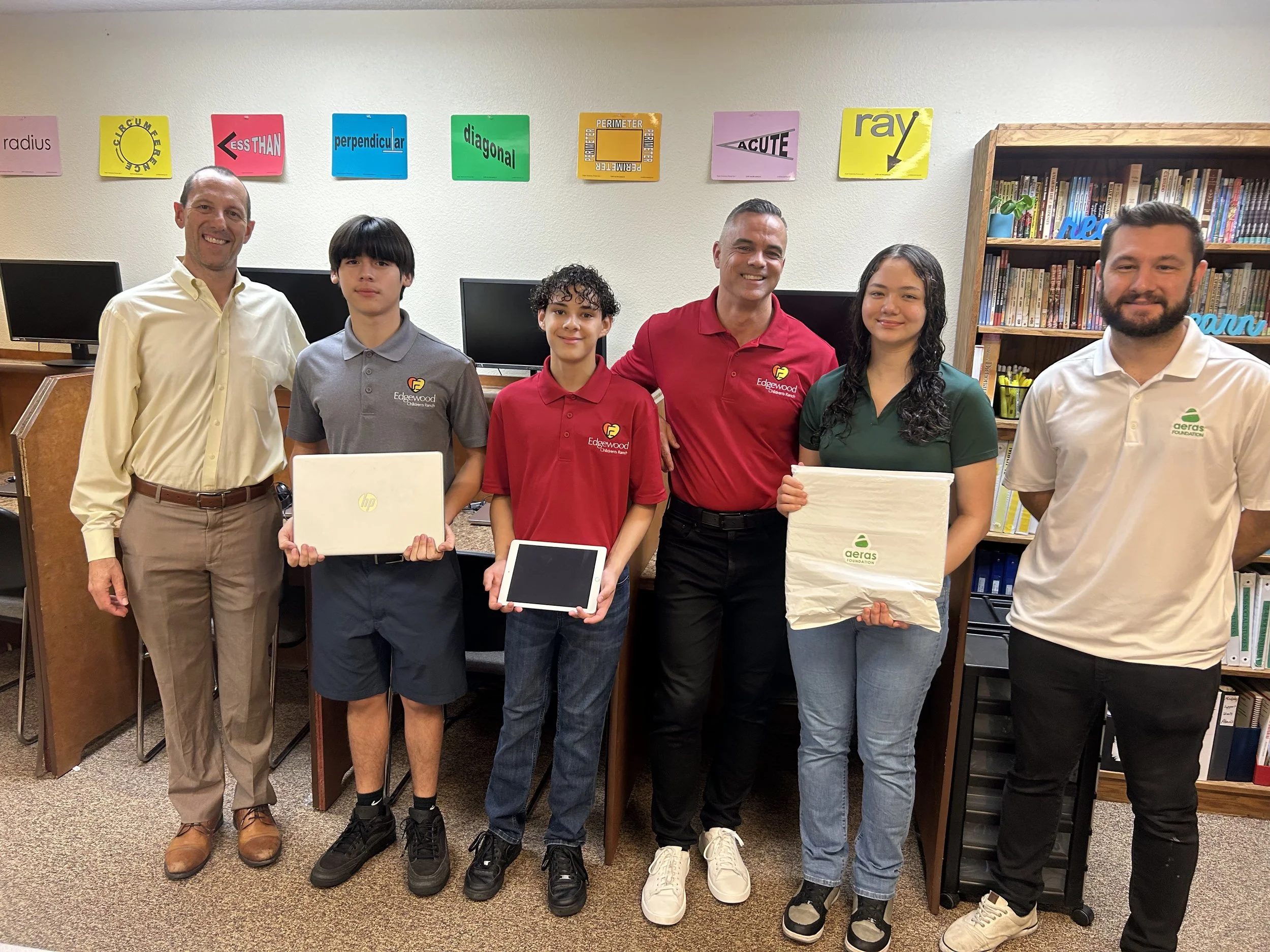 The Aeras Foundation donated several computers and laptops to the Edgewood Children's Ranch nonprofit in Orlando, Florida.