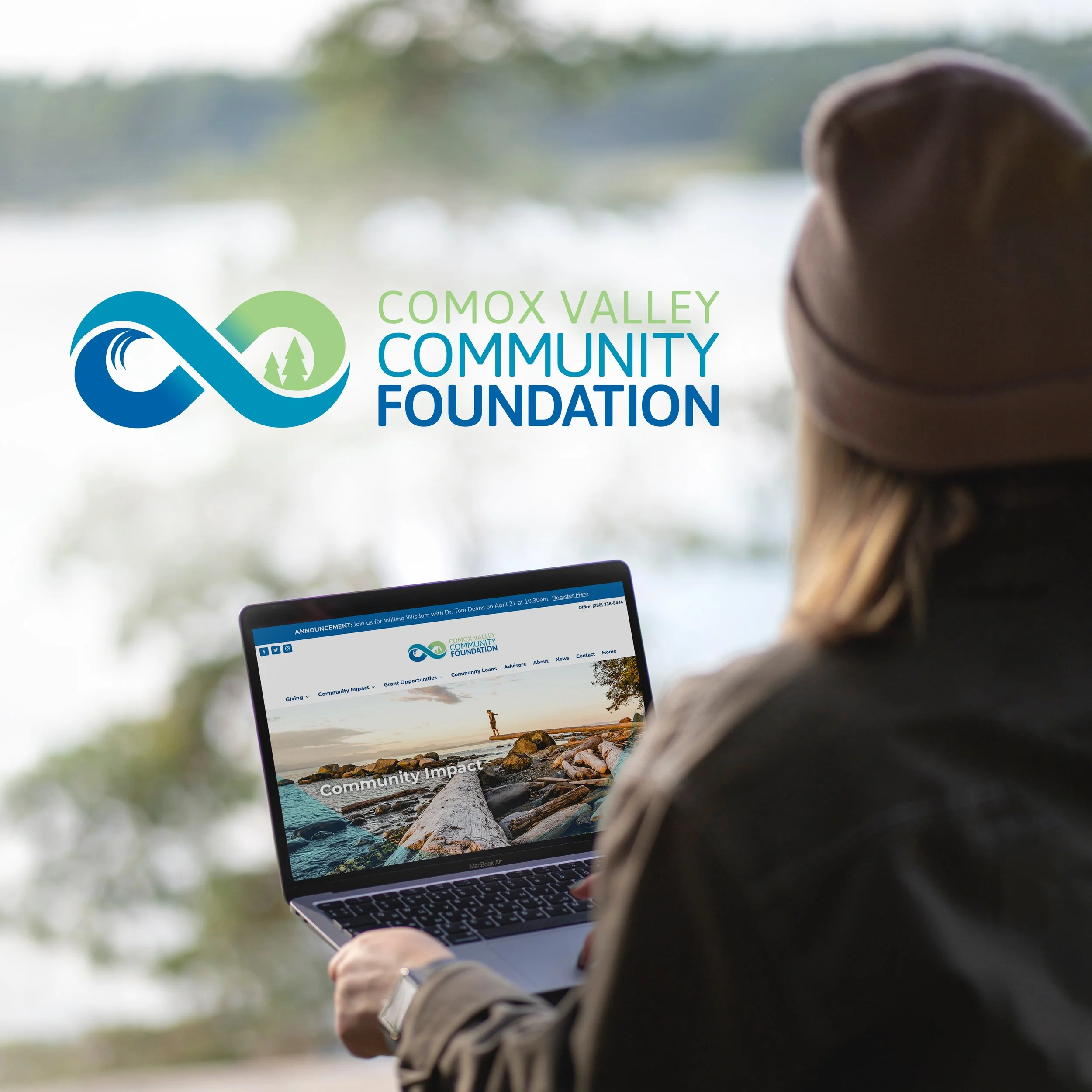 Person using a laptop outdoors with the logo and website of the Comox Valley Community Foundation on the screen.