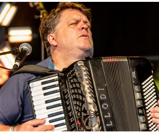 Michael Ward-Bergeman playing the accordion