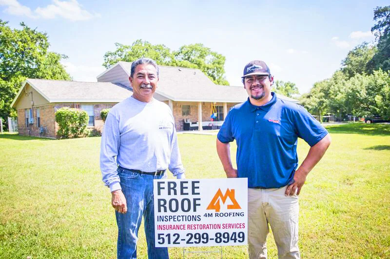 Antonio and Manuel with sign lighter.jpg