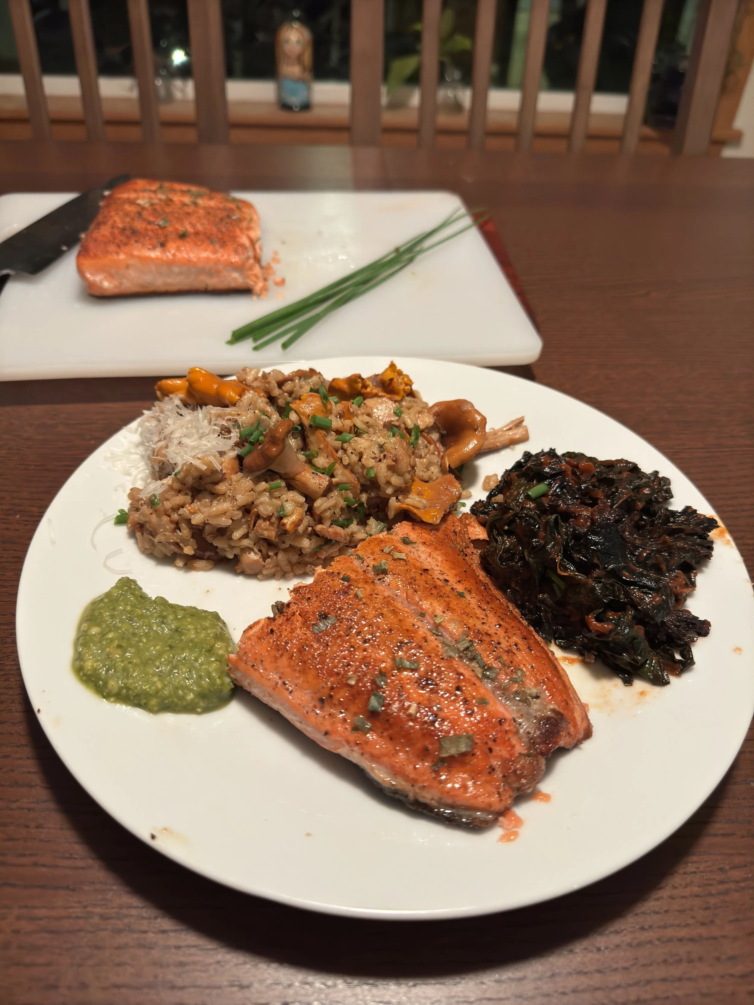 -Forage chanterelle risotto, Kale from the garden, and a salmon fillet a customer gifted Steven 