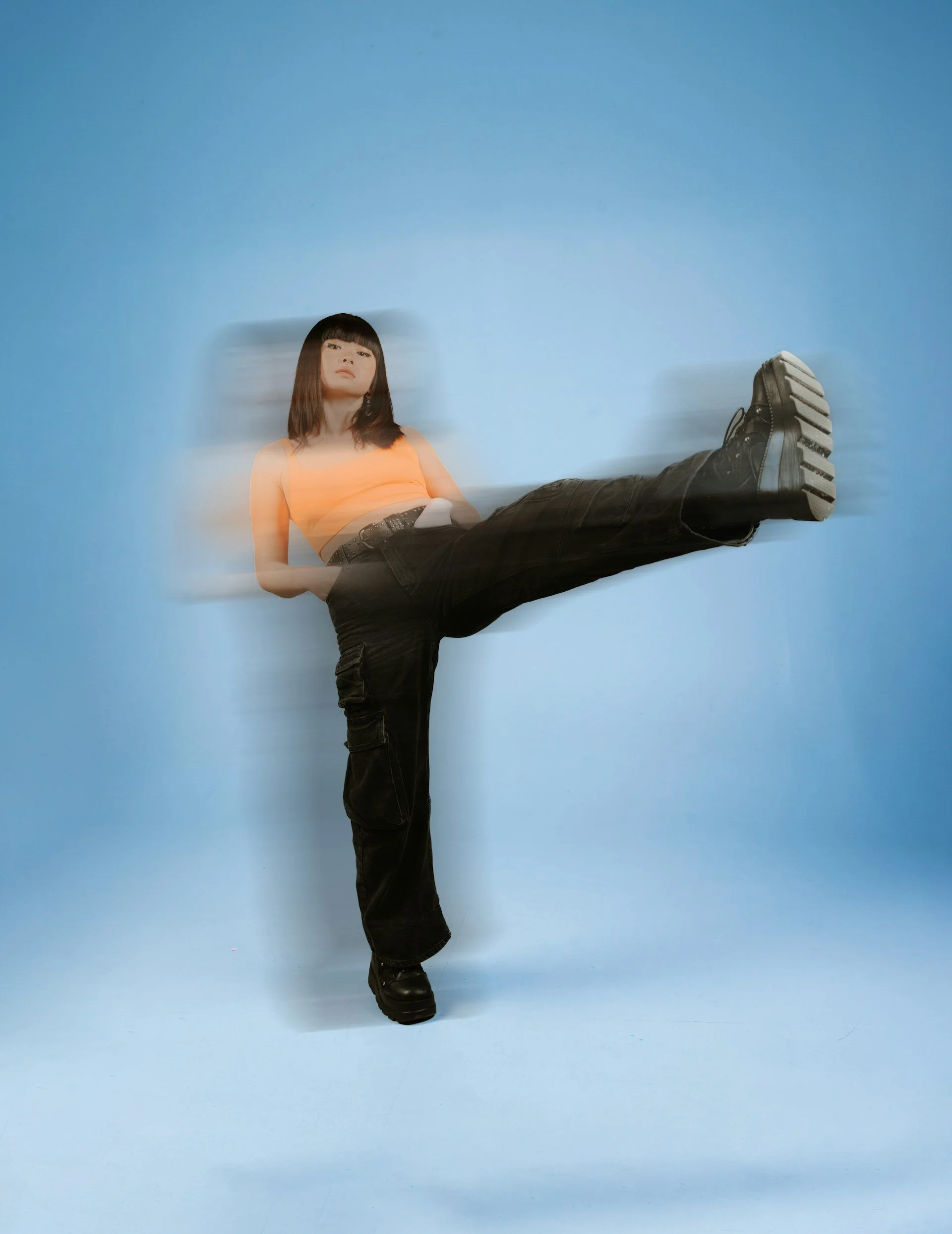 A woman moving through space, looking at how somatic therapy works