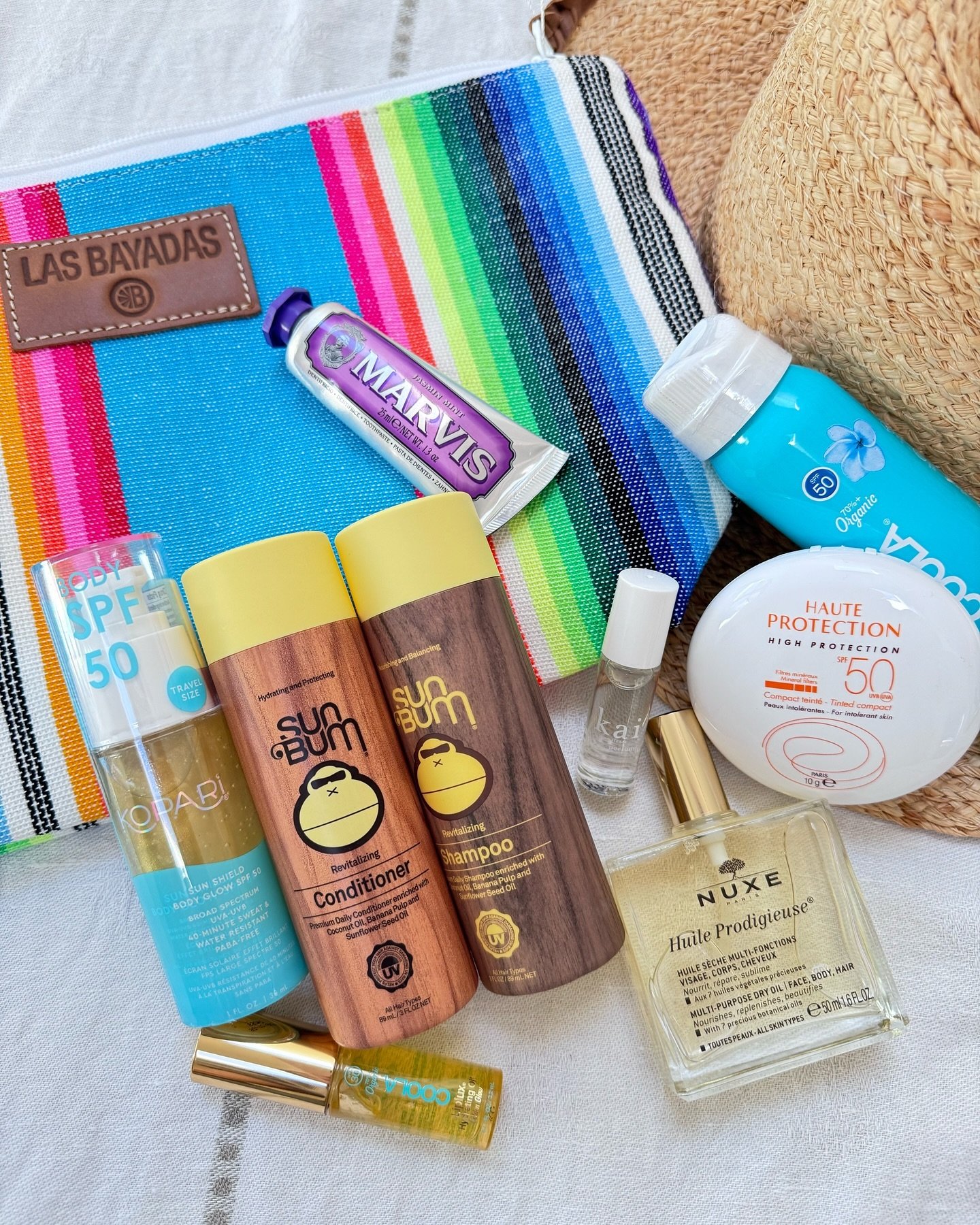 TRAVEL BUDDIES ✈️🌍 our tote is always ready, Vacation or Staycation 
Stripe Waterproof Tote
Sun Bum Shampoo
SPF Organic Cool Sunscreen
Marvis Toothpaste
Kopari SPF 50 Sun Sheild
Kai Perfume
Nuxe Dry Oil
Avene SPF tinted compact
Coola Liplux SPF 30
S