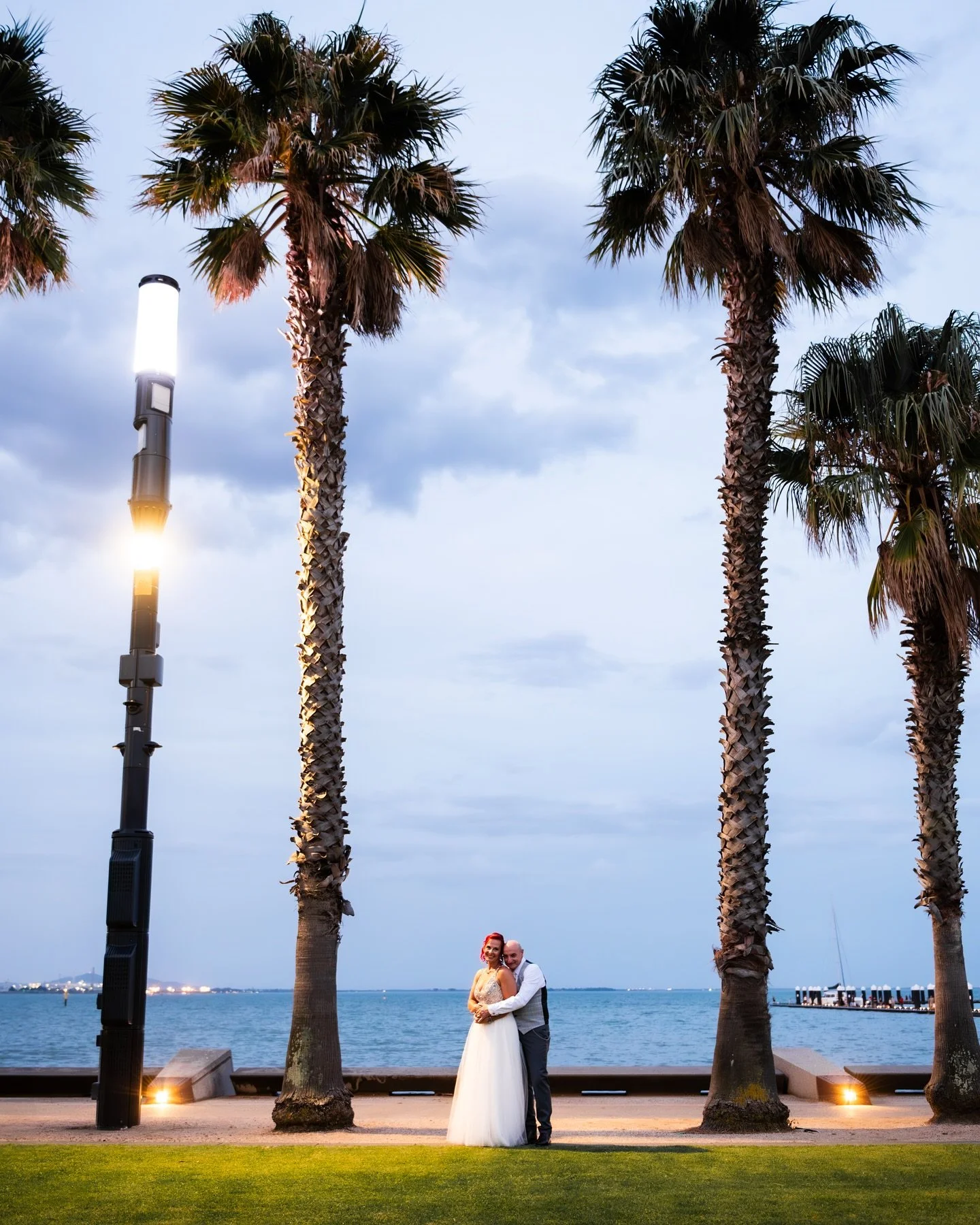 🎡
We didn&rsquo;t get much of a sunset on Mark &amp; Nina&rsquo;s day, but a walk along the waterfront at dusk more than made up for it 

#geelongwedding #geelongweddingphotographer #geelongweddingphotography #weddingsgeelong