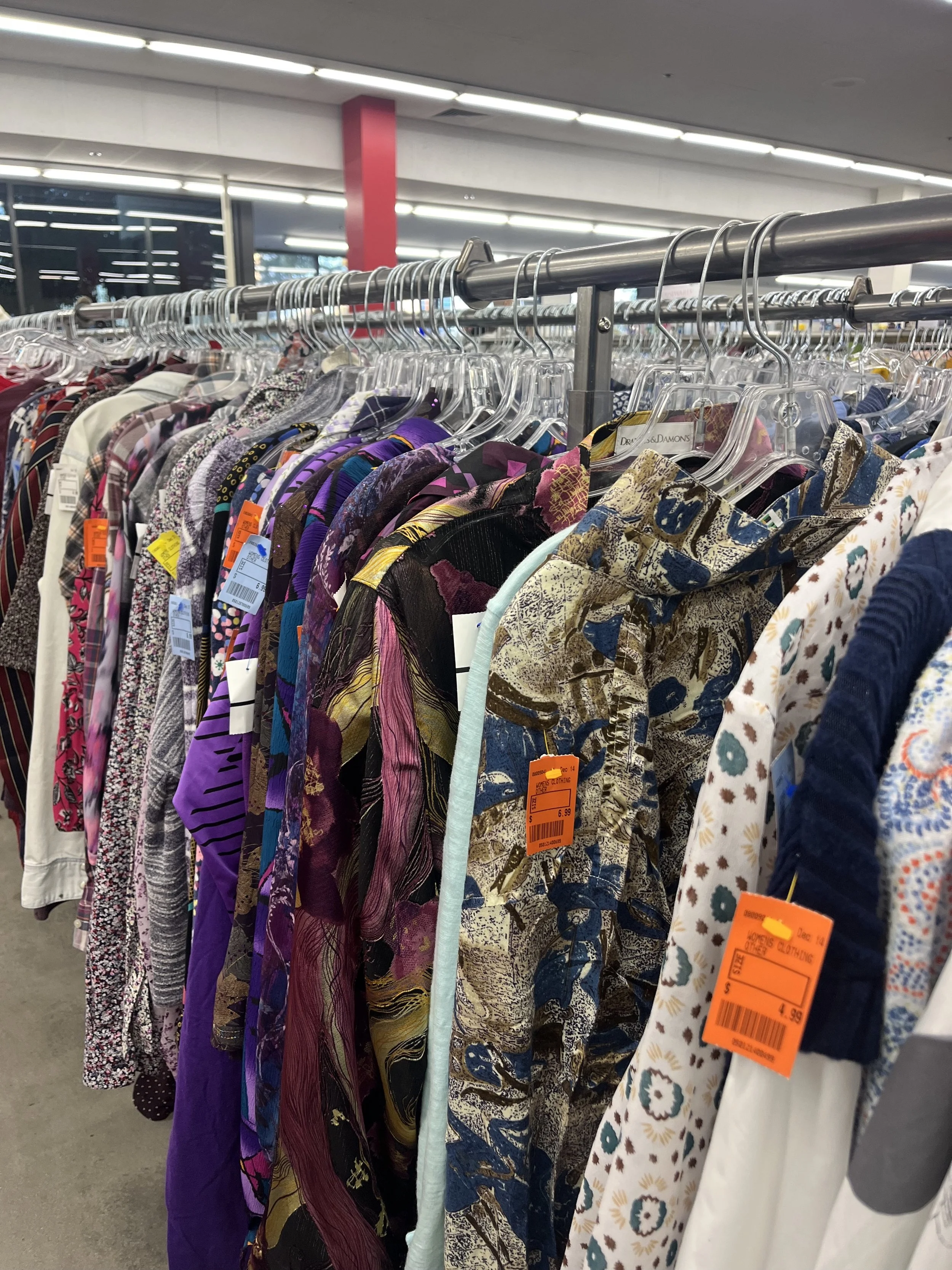 Personal stylist Tracy Cyprow sourcing unique clothing while thrift shopping for clients in New York City and the San Francisco Bay Area.