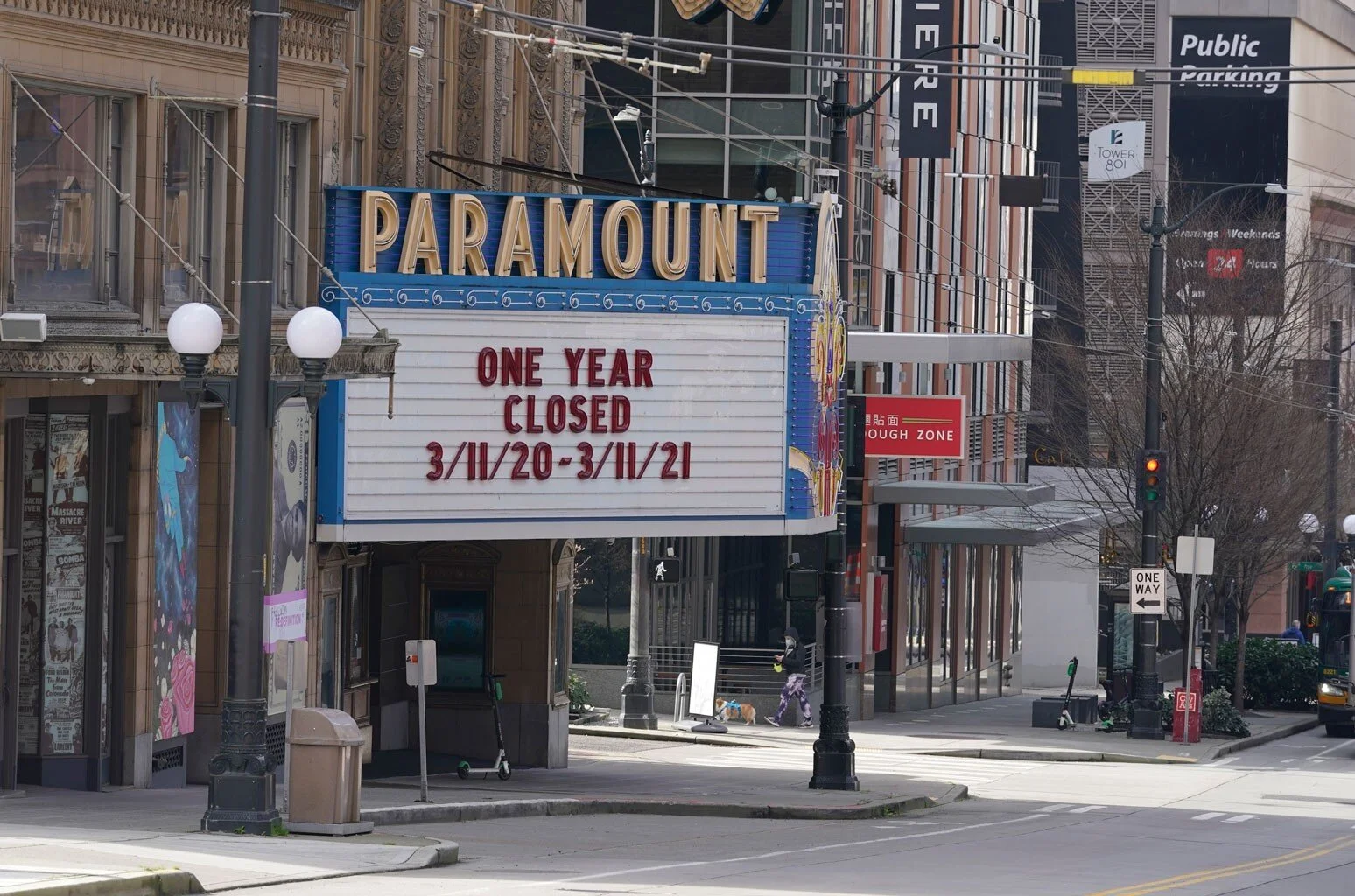 The Paramount Theatre in Seattle displays a message marking their one year anniversary of the date they closed due to COVID-19 (Photo Credit: AP Photo / Ted S. Warren)