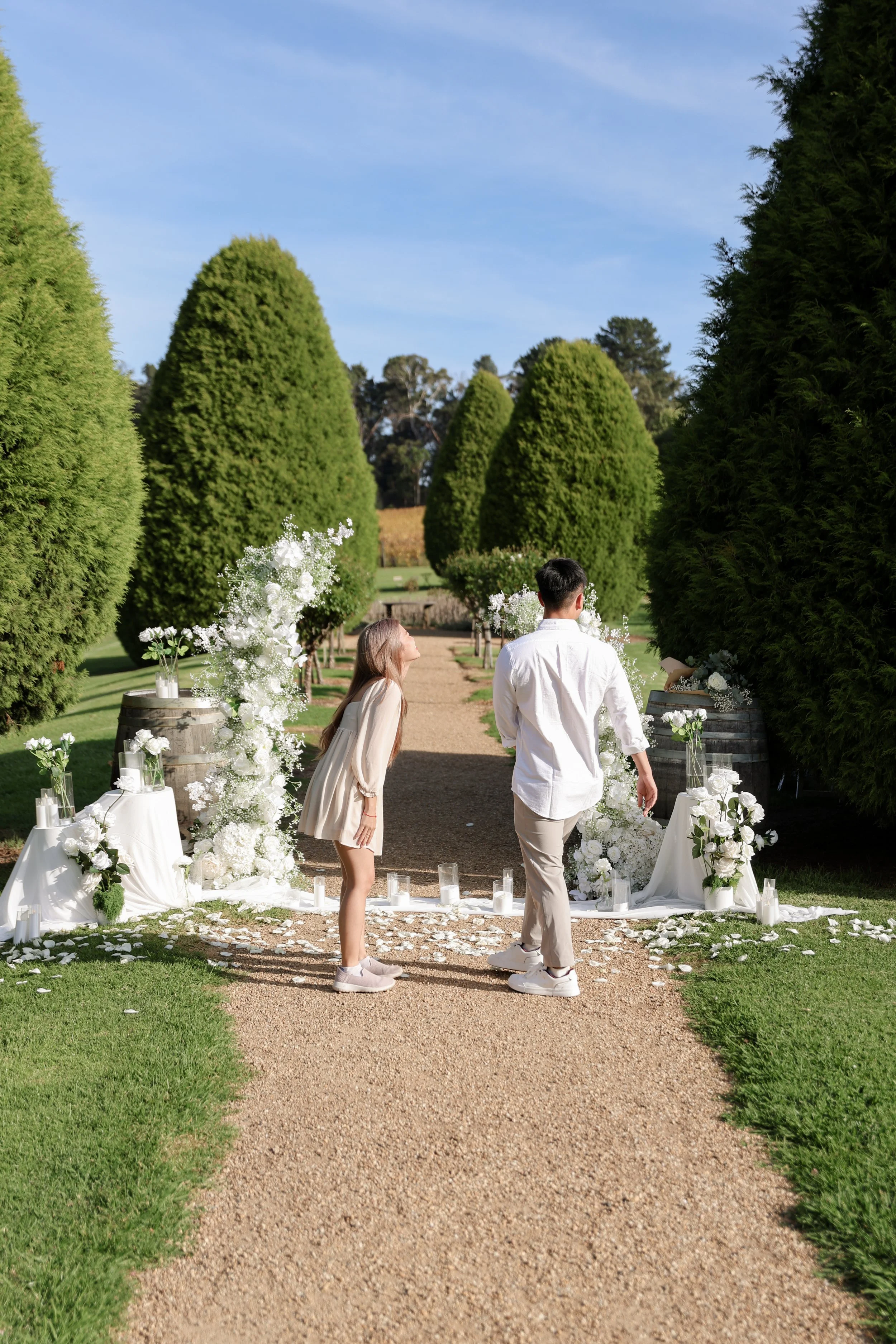 Luxury winery proposal at Lindenderry Red Hill on the Mornington Peninsula, featuring our Luxe Dream floral pillars, elegant romantic styling and stunning vineyard surroundings for an unforgettable Melbourne proposal.