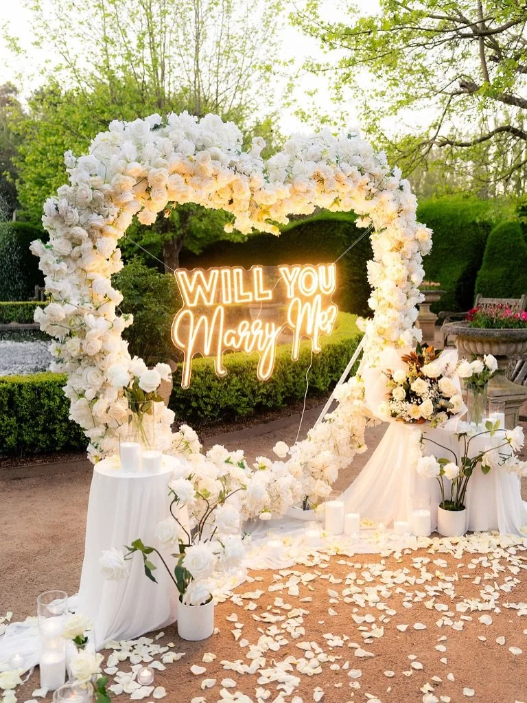 From golden hour to starlight 🌤️✨
Our dreamy white rose setup at Ashcombe Maze &mdash; pure romance, day and night. 🤍

#PerfectProposals #AshcombeMaze #WhiteRoseProposal #GardenProposal #DreamProposal #RomanticProposal #ProposalGoals #ProposalInspo